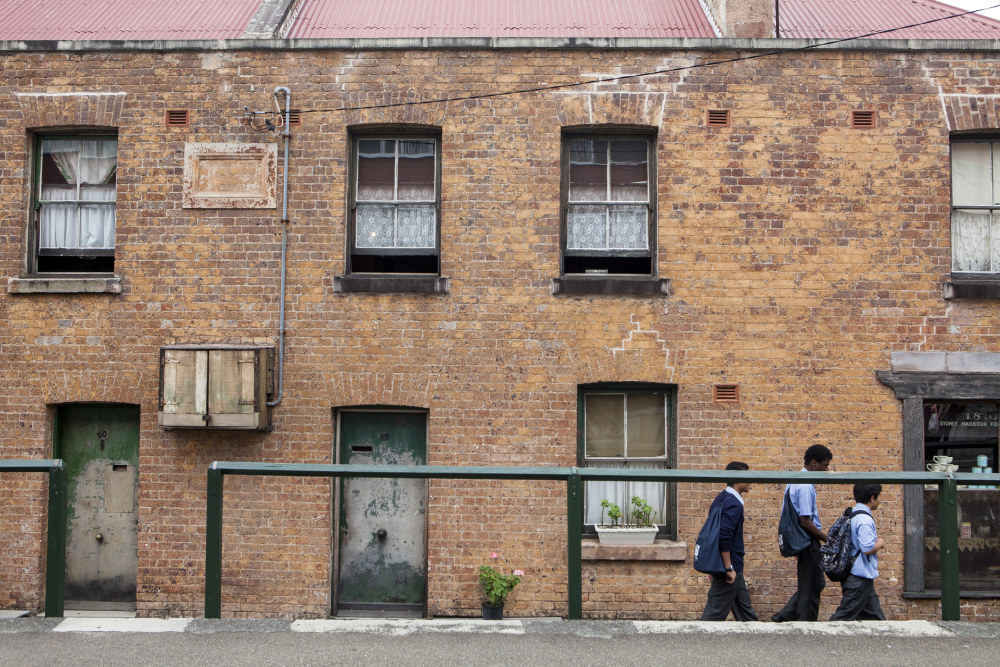 School students outside the Gloucester Street facade, Susannah Place Museum