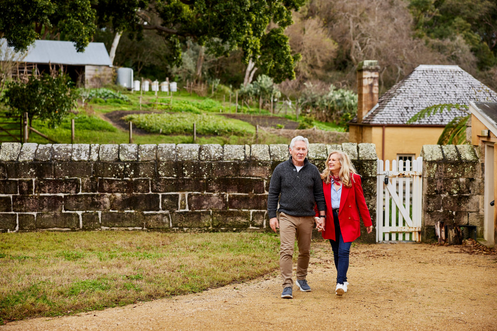 A couple exploring the Vaucluse House grounds