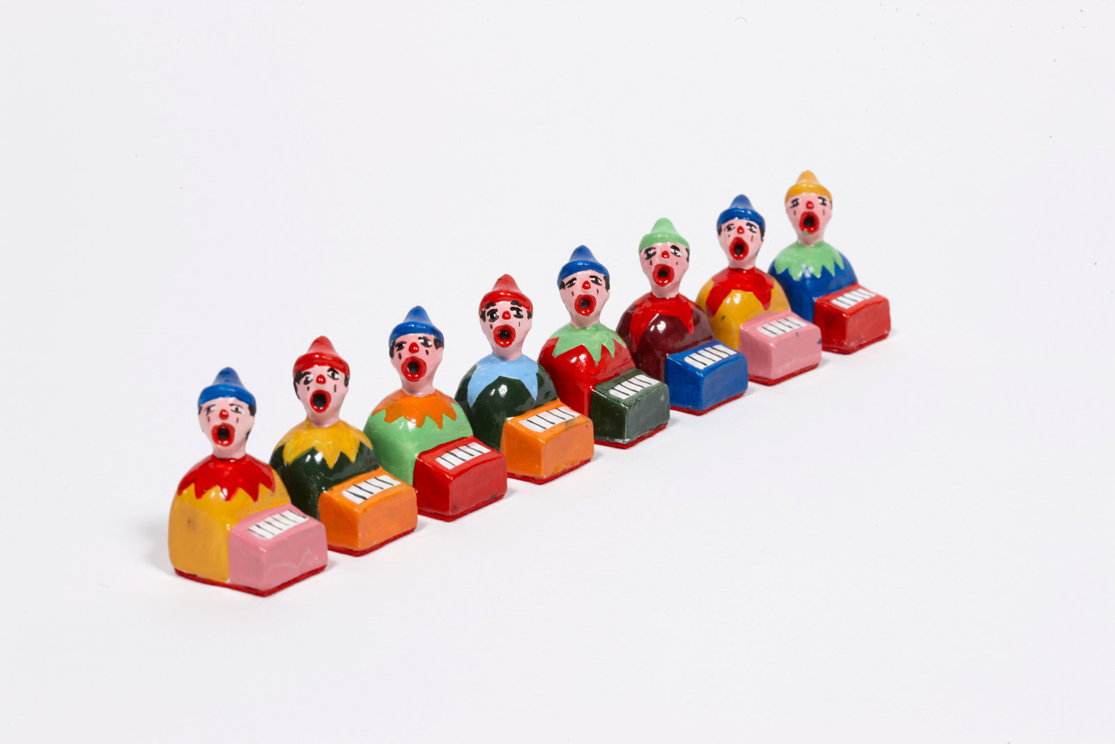 Pawn chess pieces from Luna Park chess set, created by artist Peter Kingston in 2001