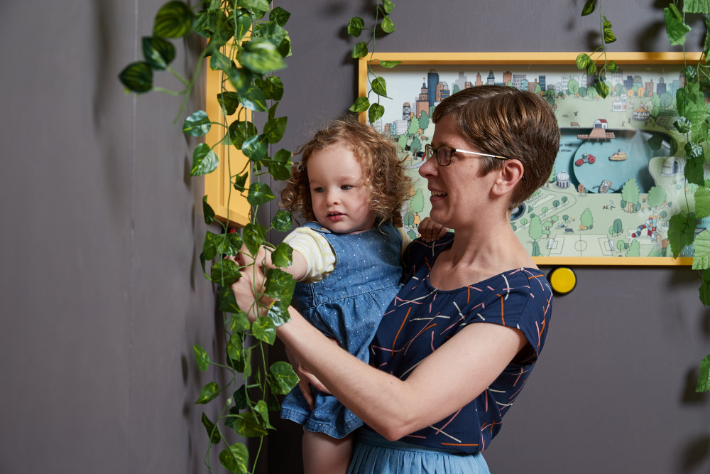 A mother and daughter at the How Cities Work exhibition held at the Museum of Sydney