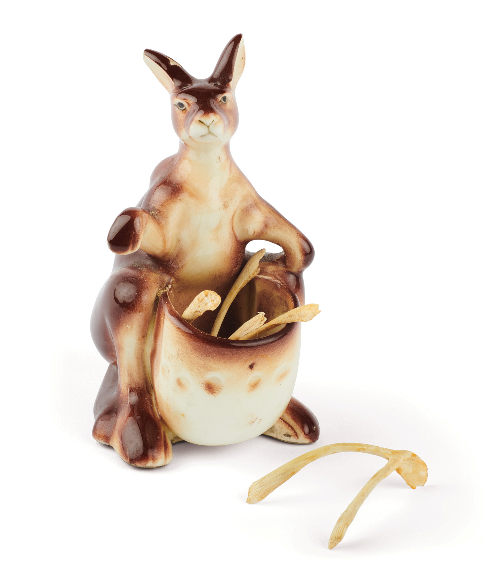 Ceramic kangaroo salt shaker with chicken wishbones in the pouch