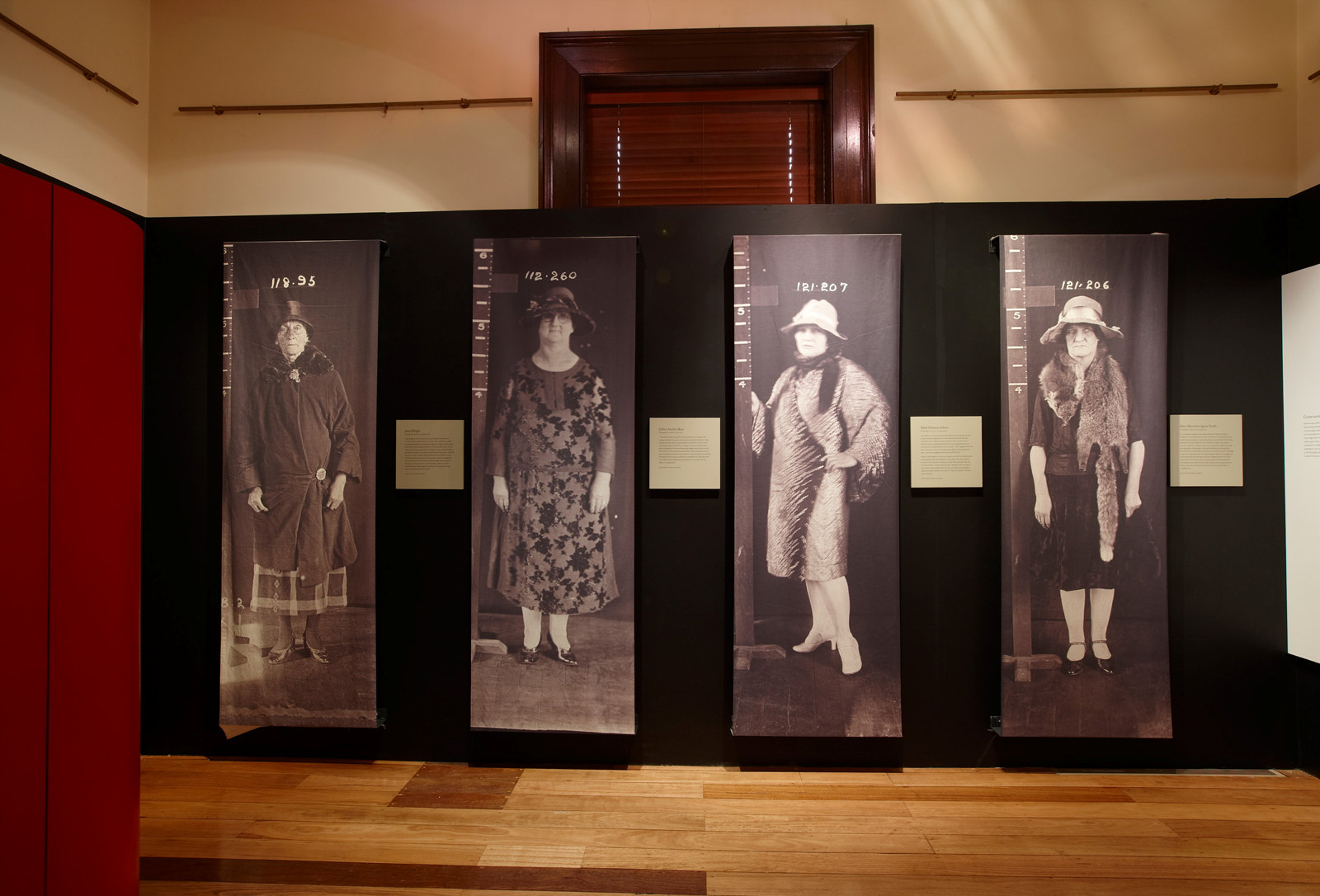 Image showing for life size black and white prints of woman standing