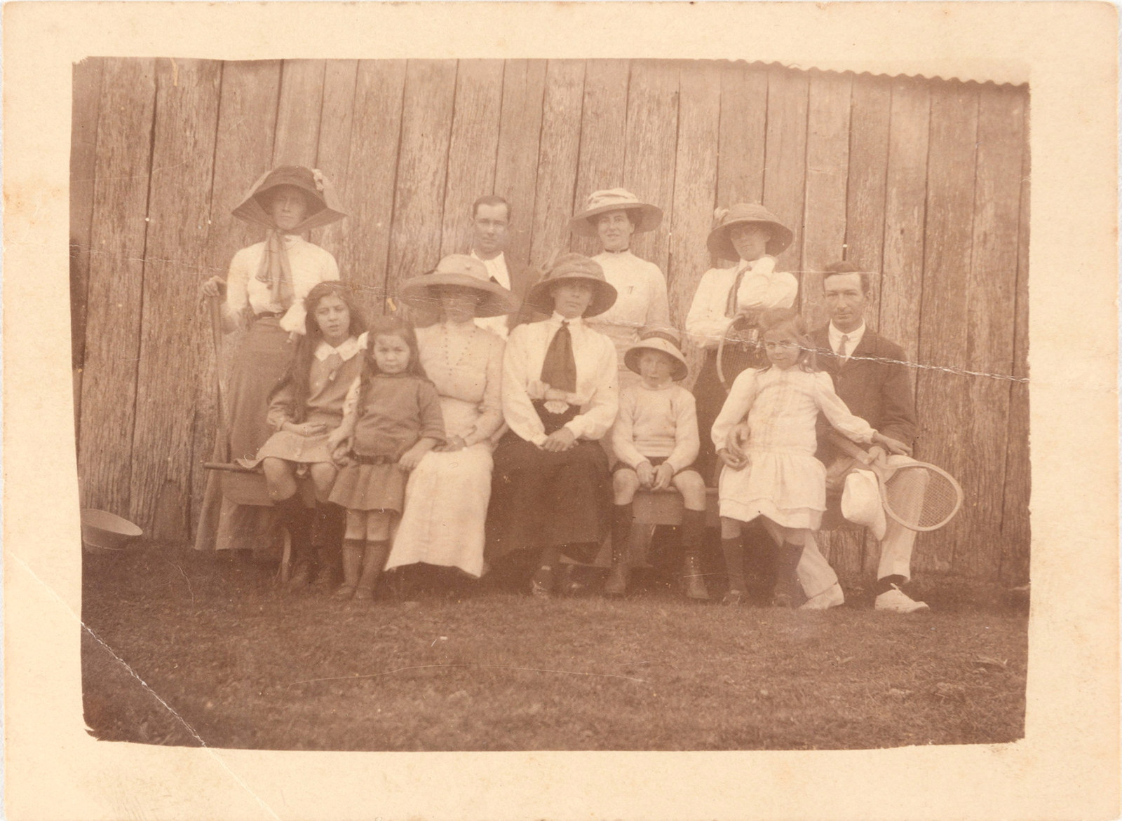 Photograph depicting a group outside the wool shed at Rouse Hill estate, including Norman M Pearce, Kathleen Buchanan Rouse and Mary Pearce, c.1910