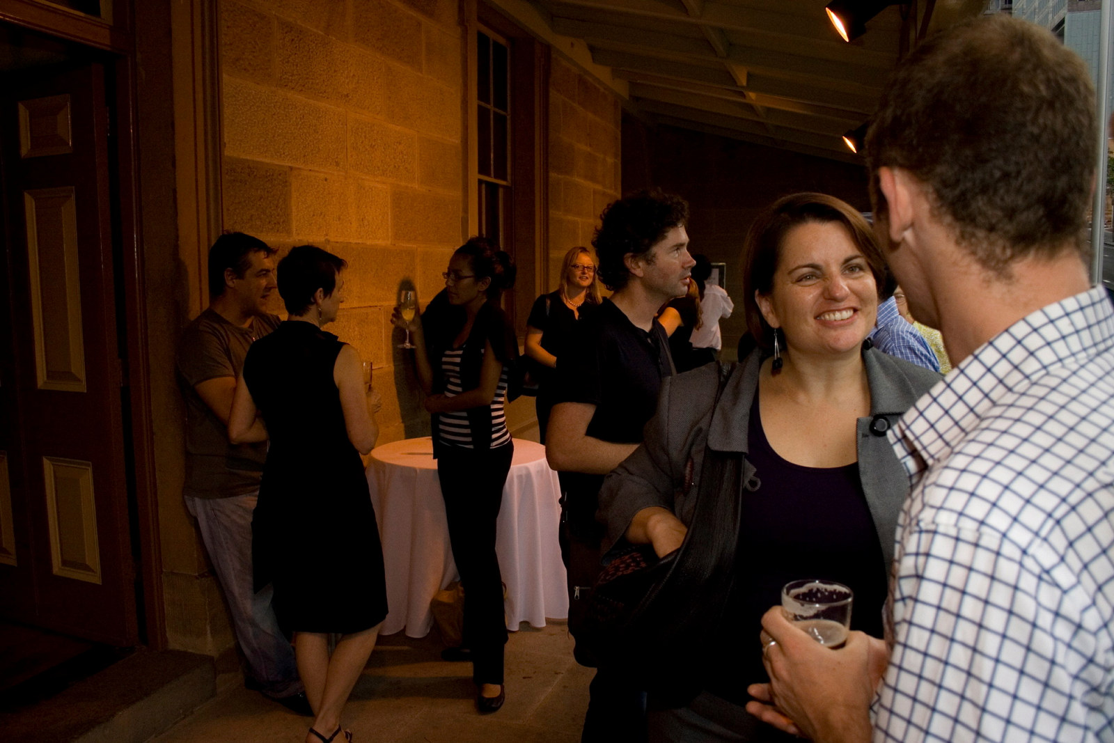Guests enjoy drinks on the verandah at the launch of SydneyÂ’s Pubs, Justice & Police Museum, 26 February 2008.