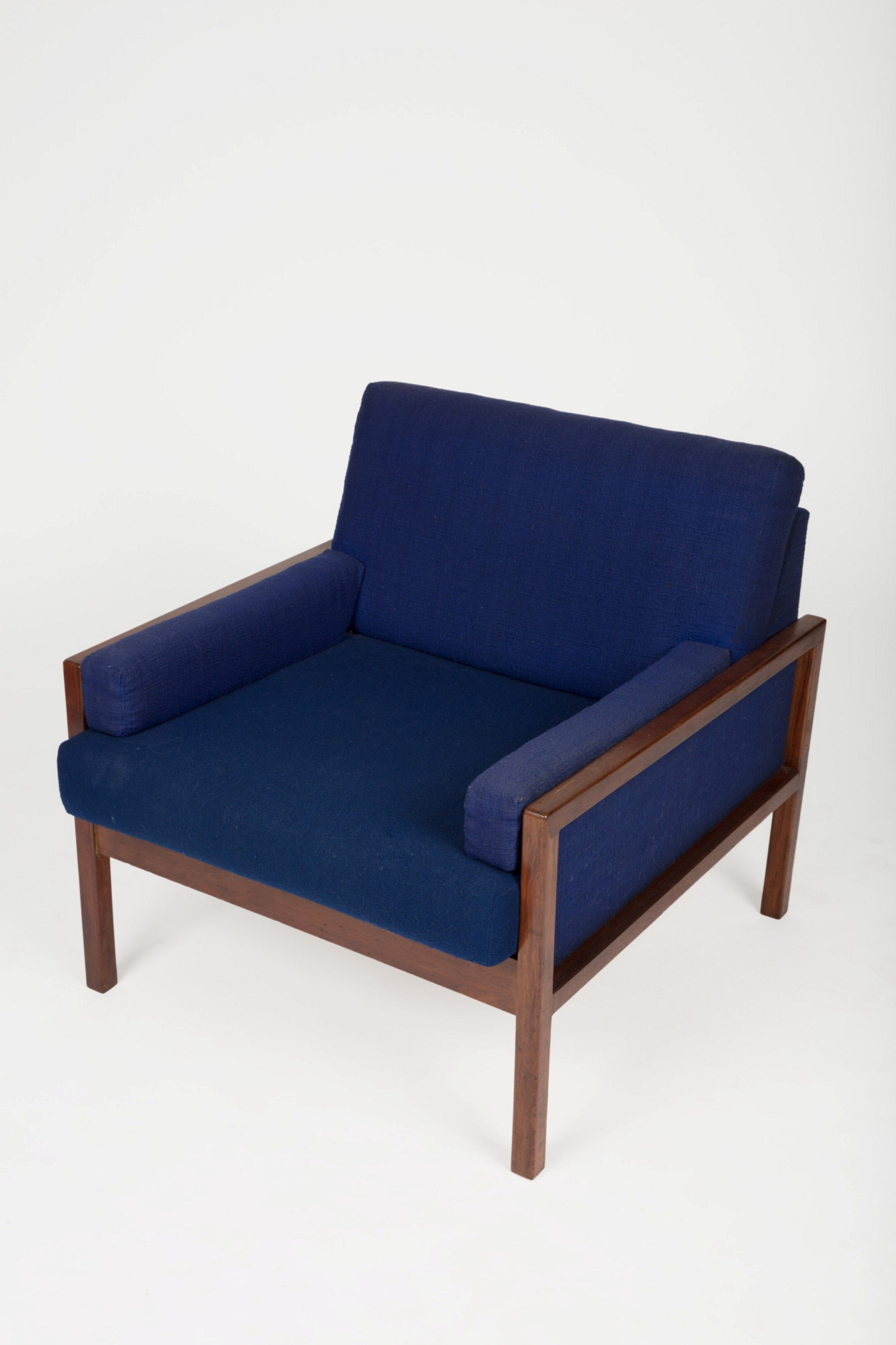 Easy chair with blue wool upholstery and wooden frame