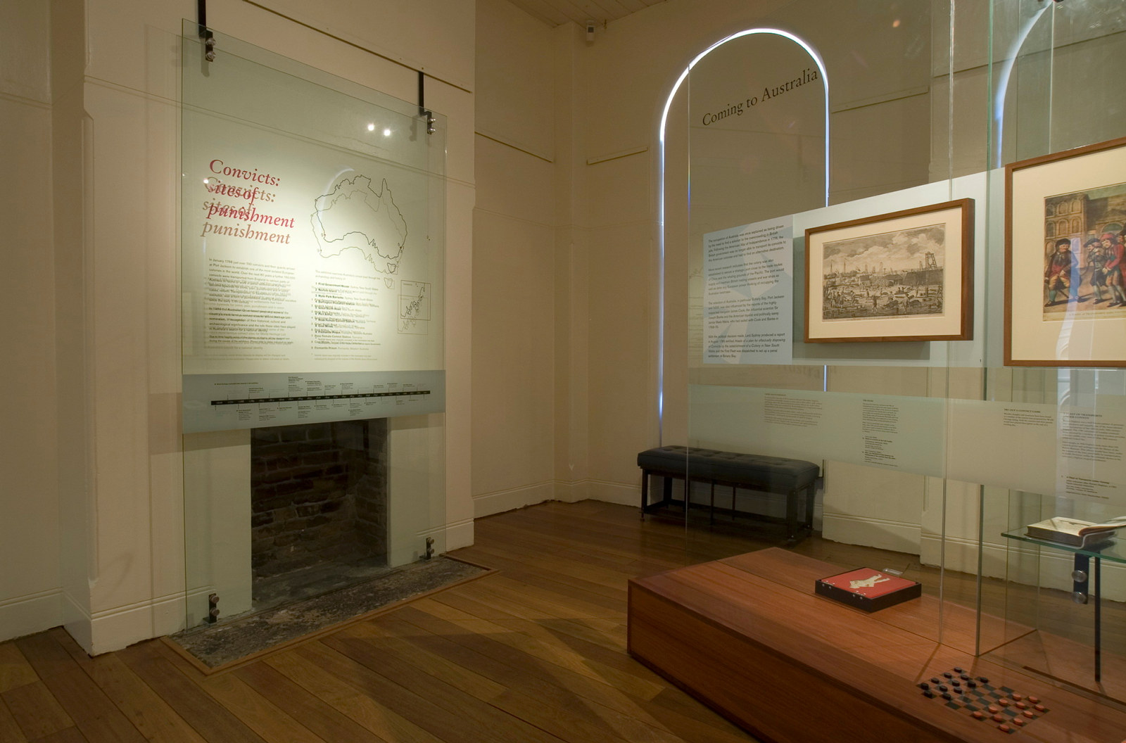 Documentation of Convicts: sites of punishment exhibition showing exhibition panel and fireplace
