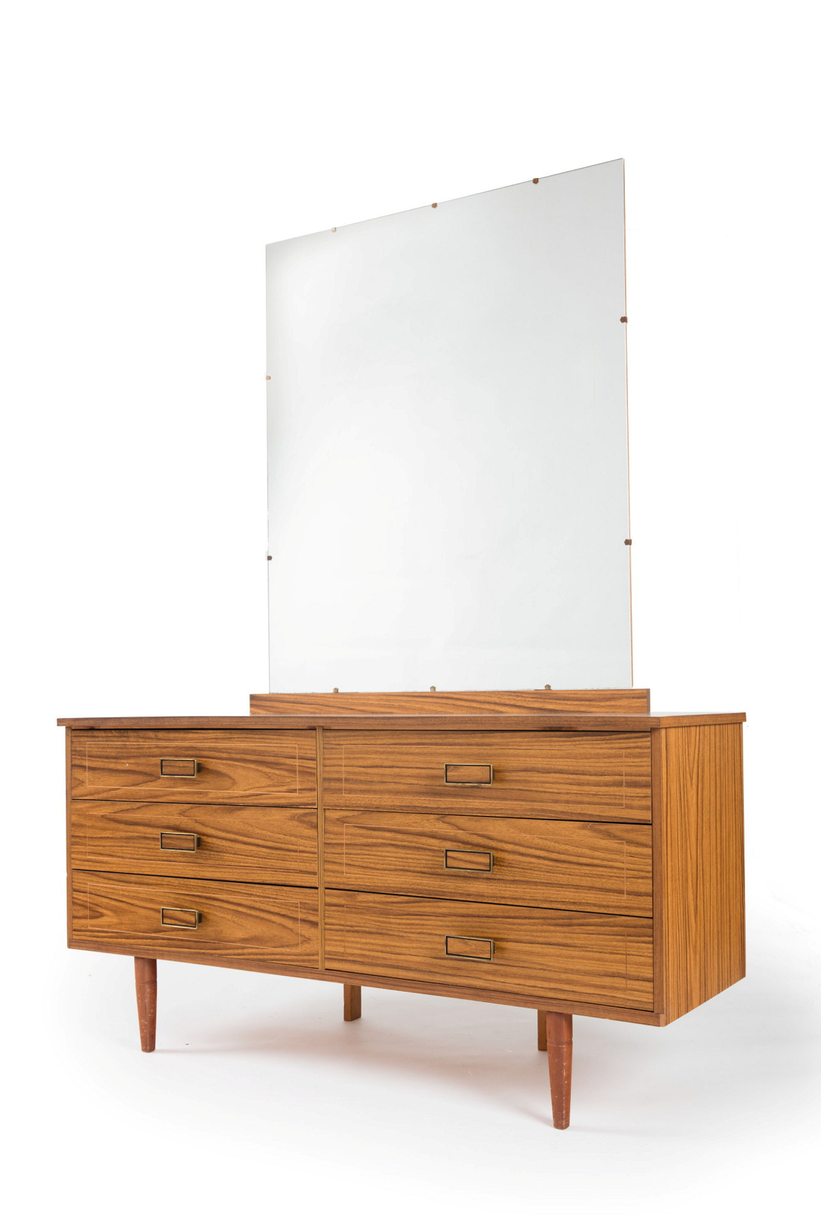 Timber chest of drawers with mirror attached above.