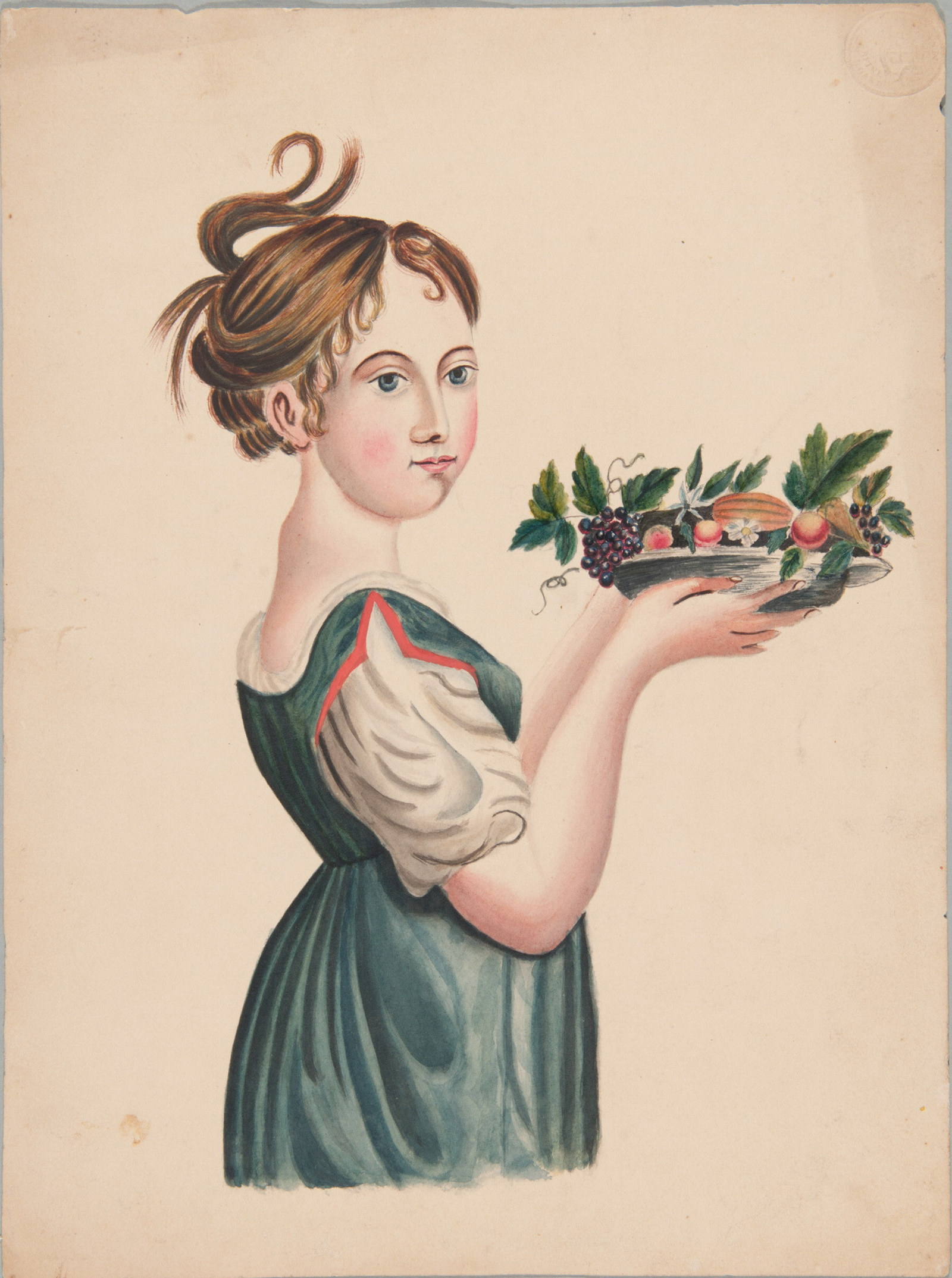 A girl holding a plate of fruit