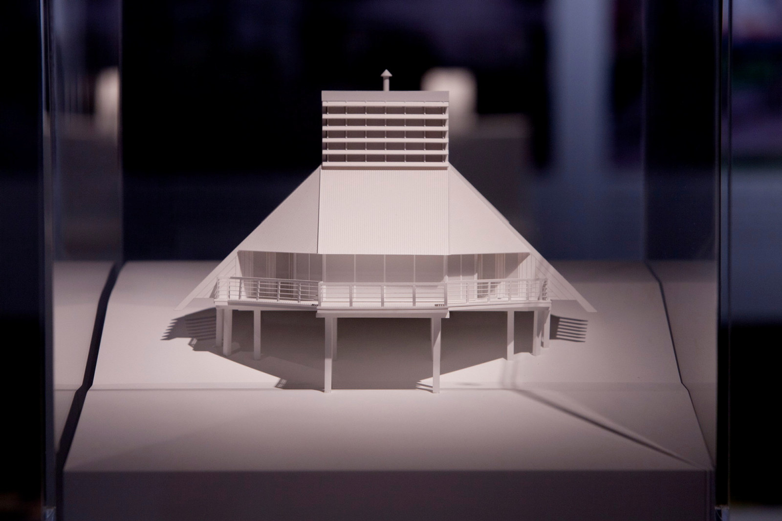 This is a detail photograph of a white architectural model of a house