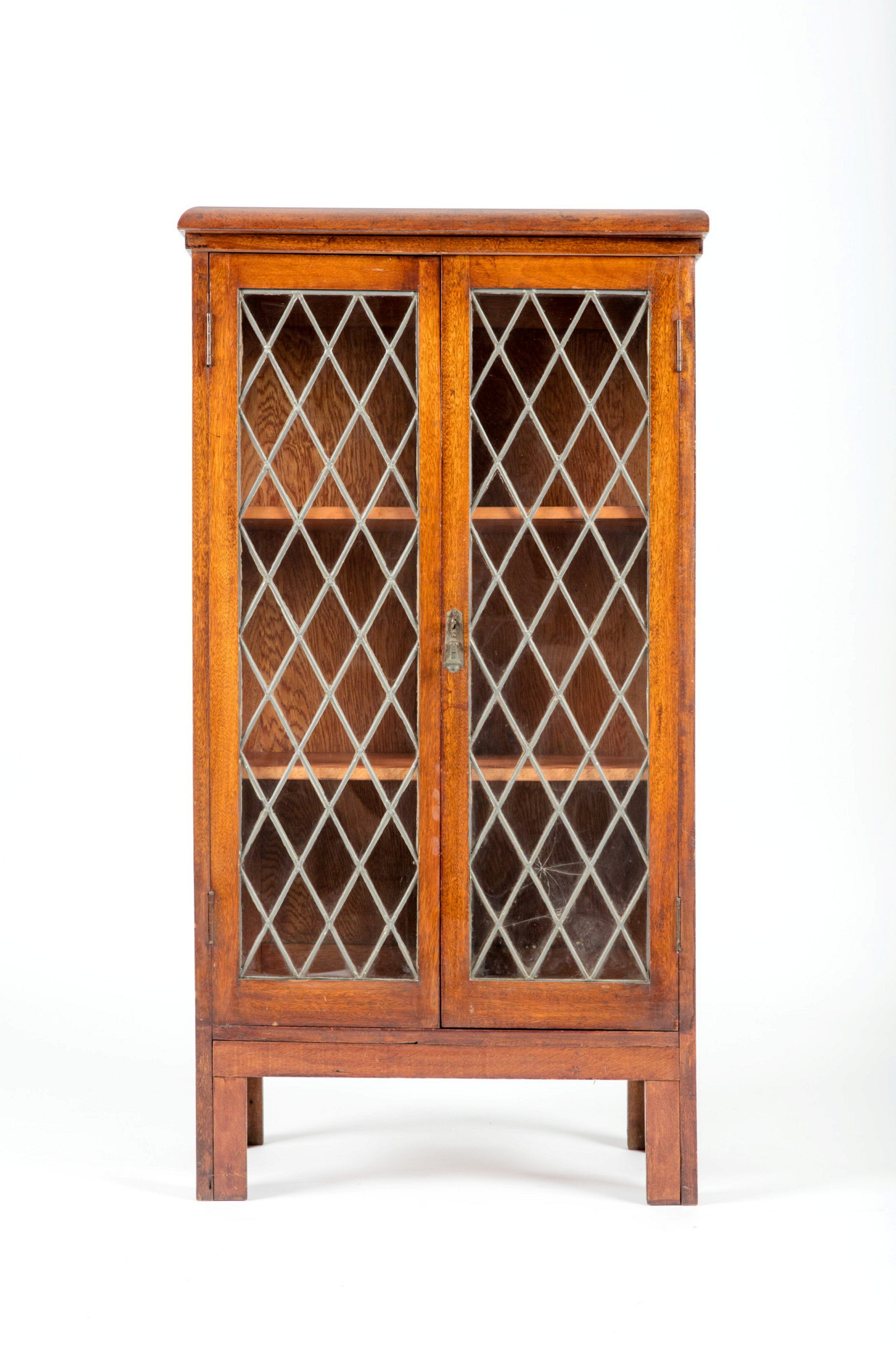 Timber cabinet with diamond shaped patterned glass front.