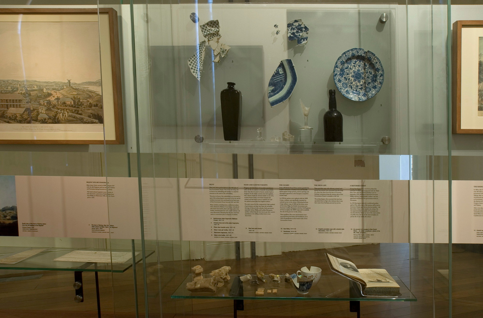 Documentation of Convicts: sites of punishment exhibition showing ceramics and glassware