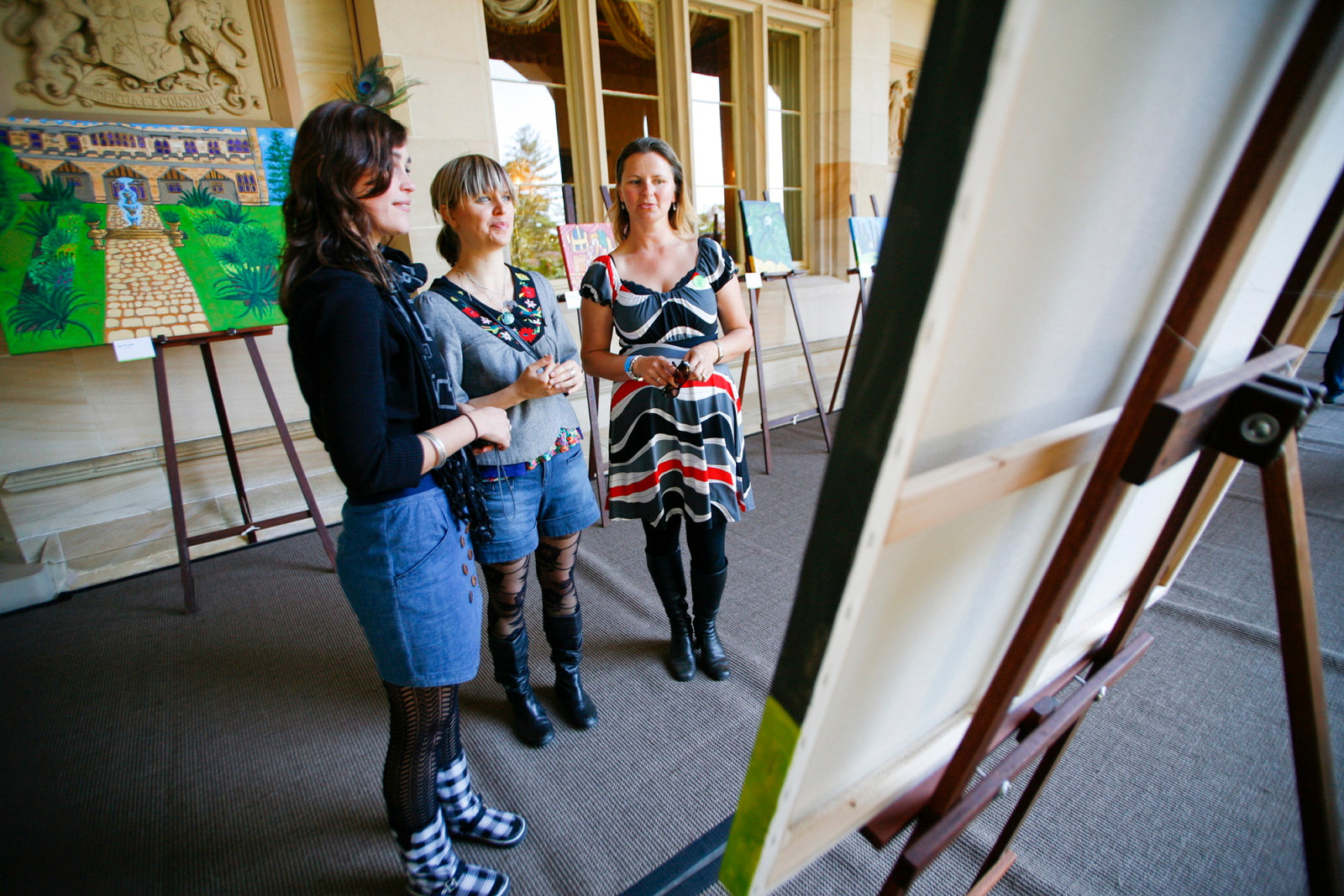 Studio ARTES paintings displayed on terrace of Government House during Garden Music