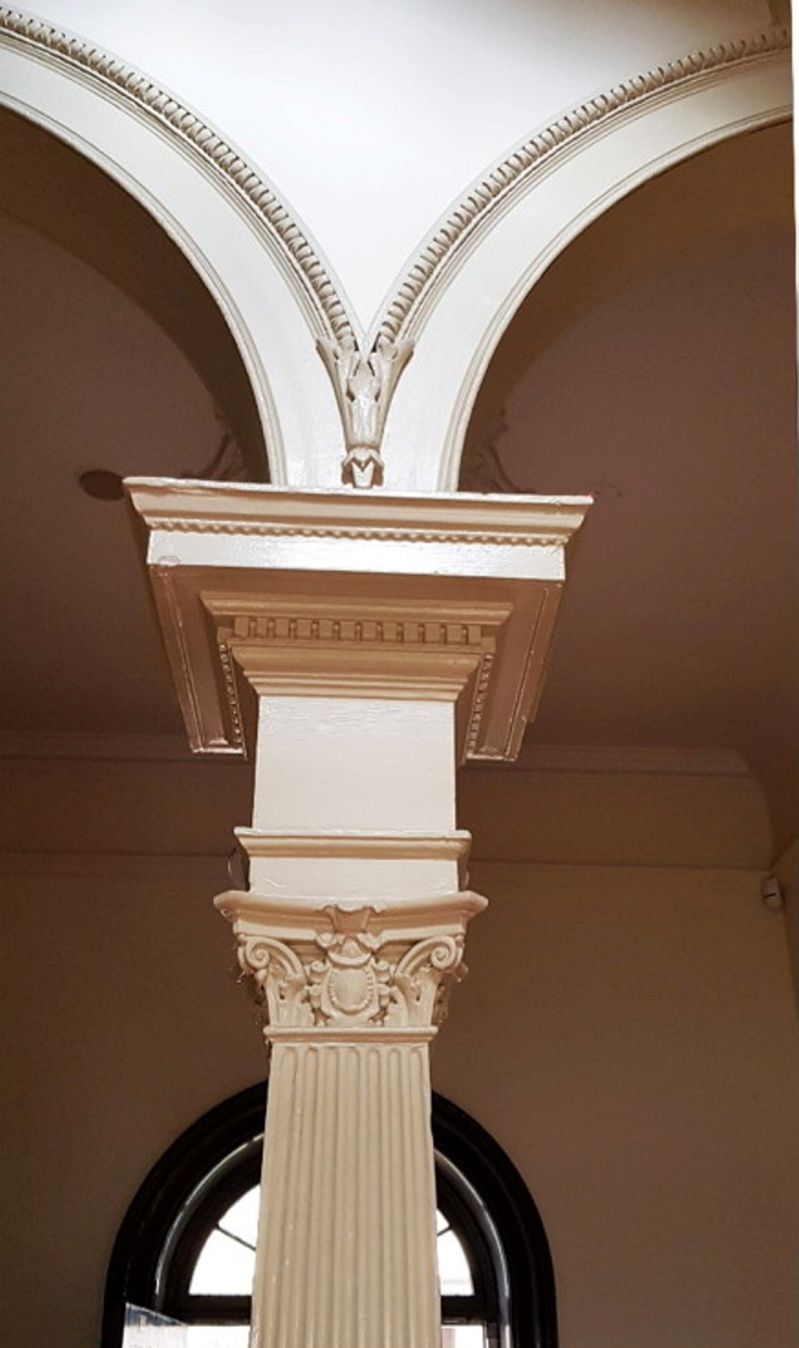 Image of the Corinthian capital supporting the archways at The Mint.