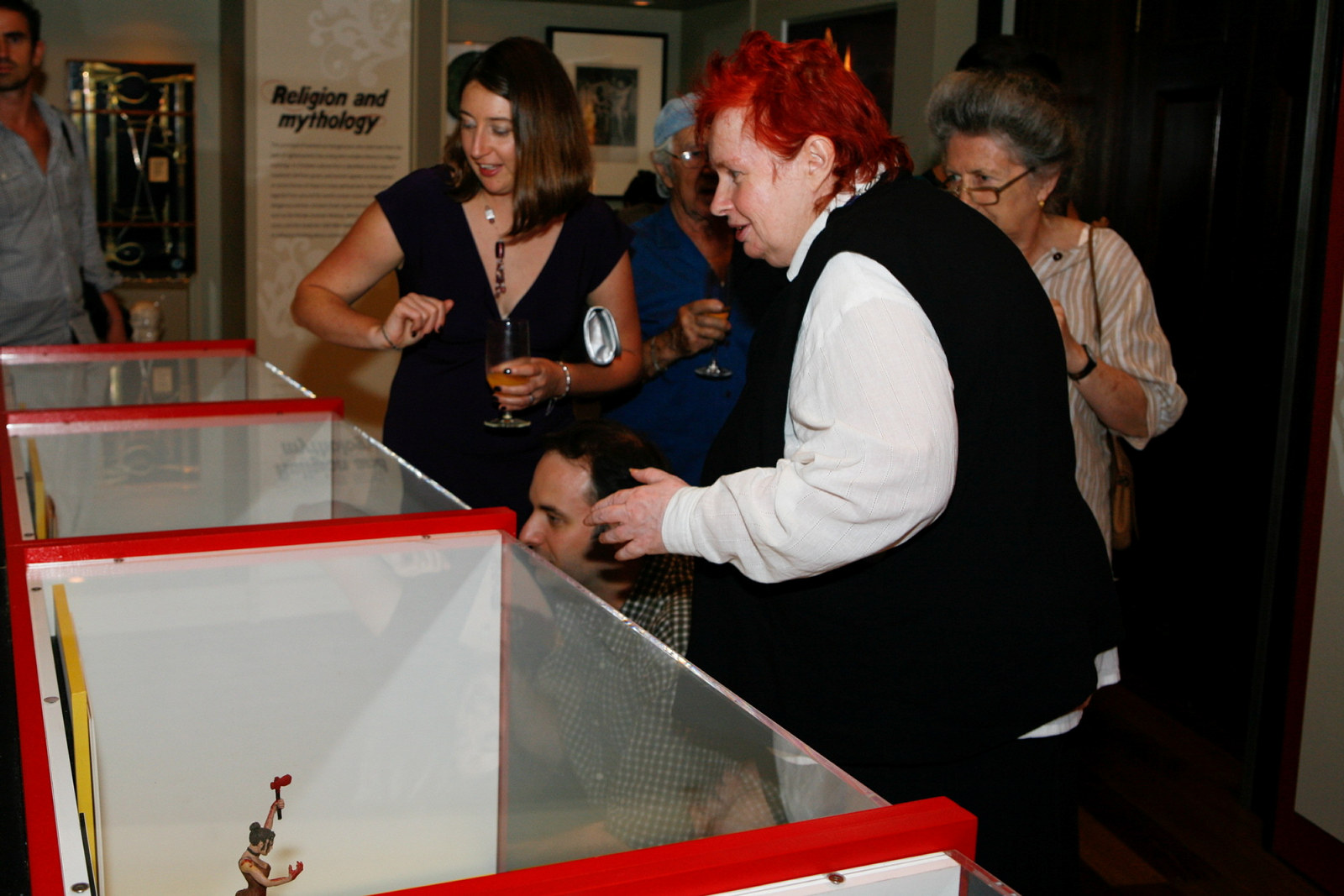 Visitors enjoy the Femme Fatale exhibition at the Justice & Police Museum