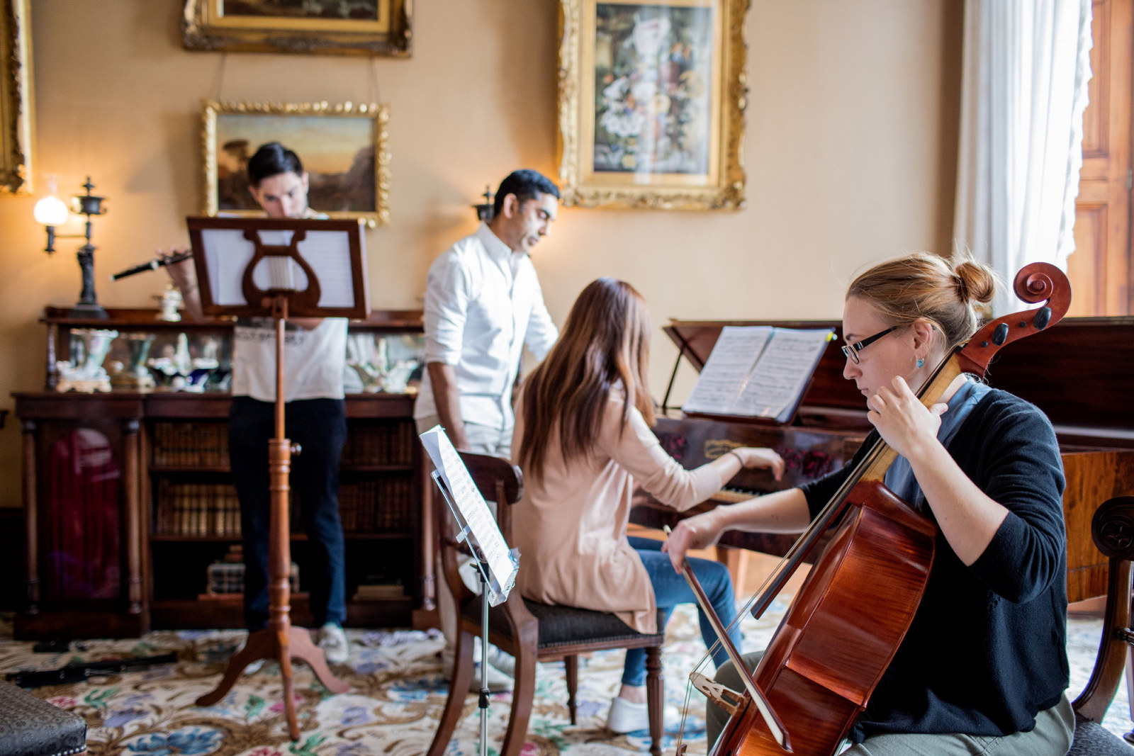 Theo Small (flute), Associate Professor Neal Peres Da Costa, Esther Kim (piano) and Jemma Thrussell (cello) from the Historical Performance Unit, Sydney Conservatorium of Music, in the drawing room at Elizabeth Bay House