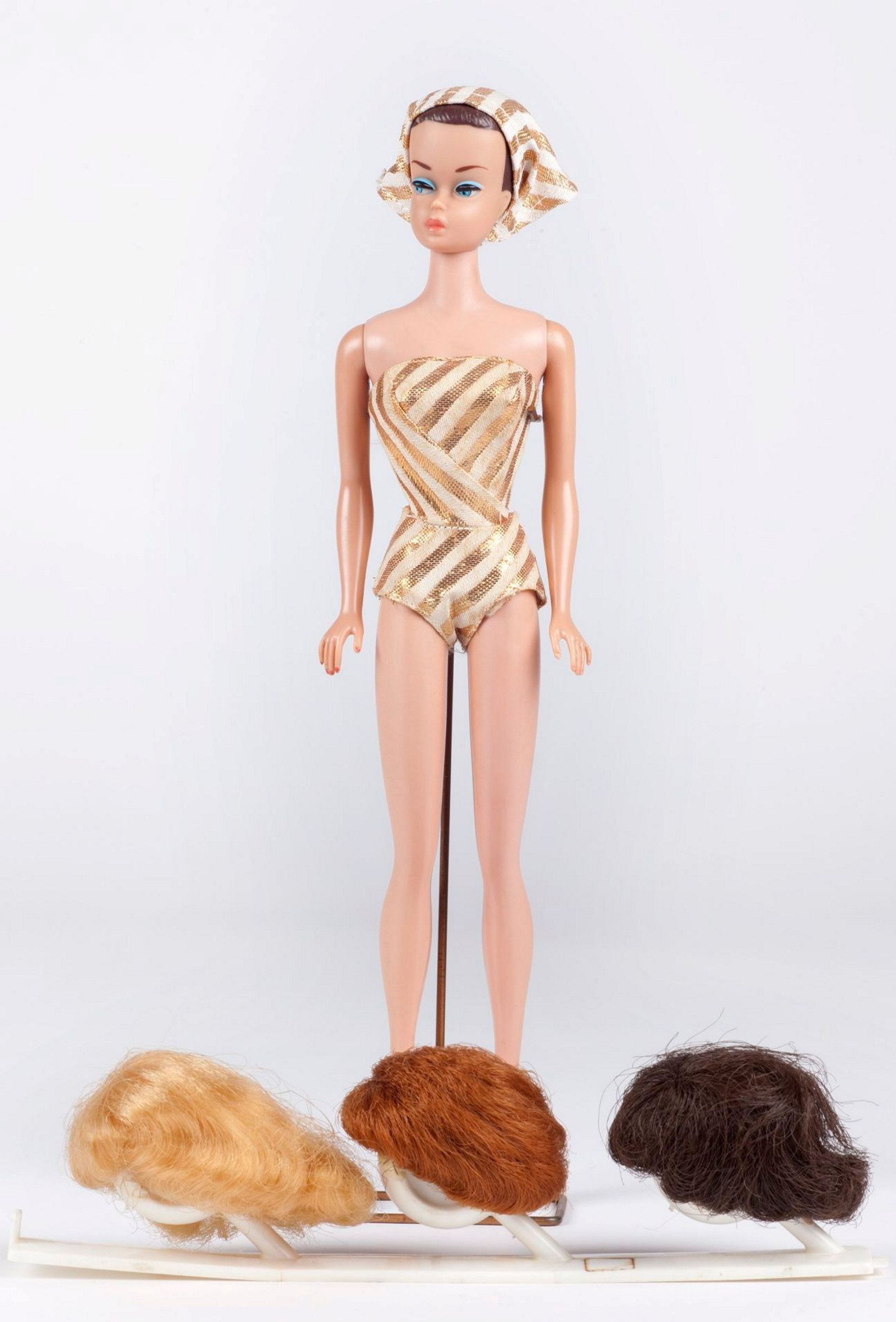 60s Barbie with array of wigs