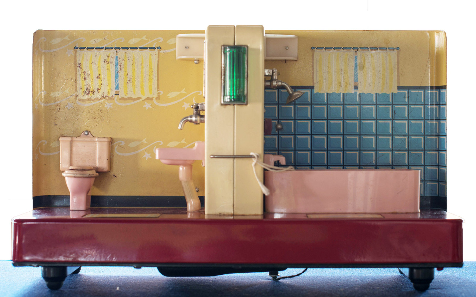 Model/sample of partitioned bathroom fitted with toilet, vanity, light and bath/shower, c.1950