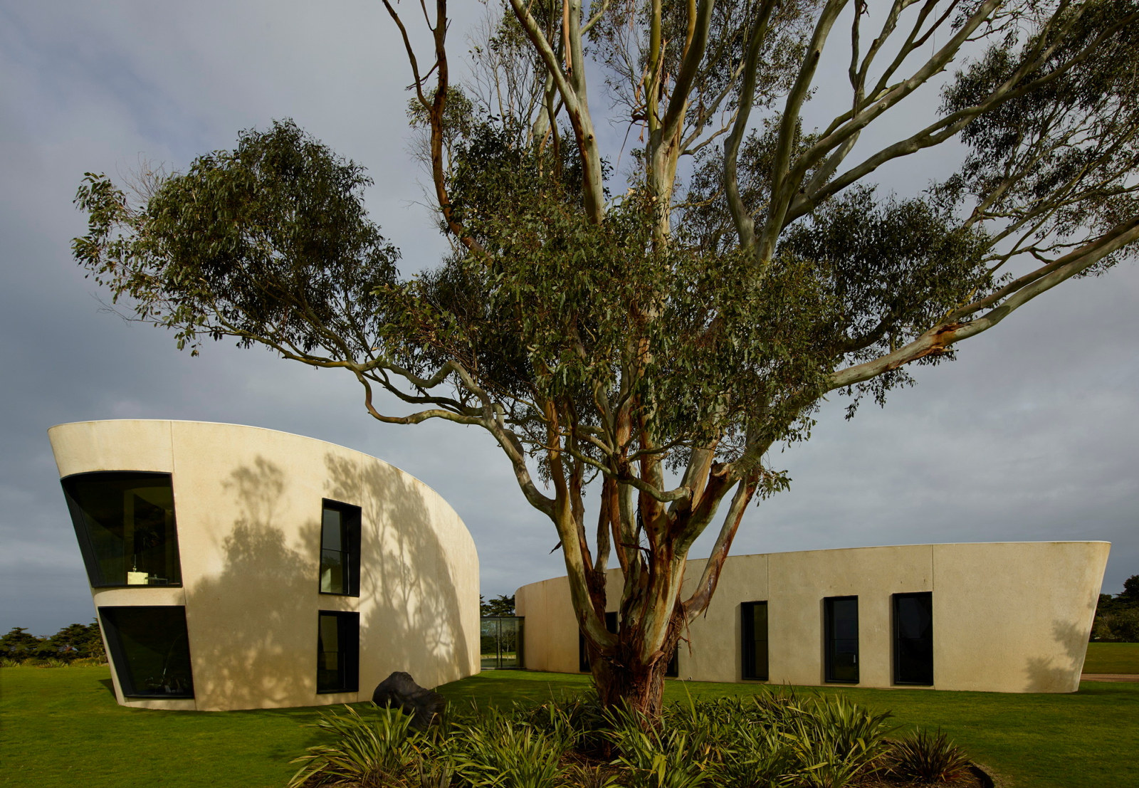 Exterior of curved modern house in Flinders, Victoria, Australia