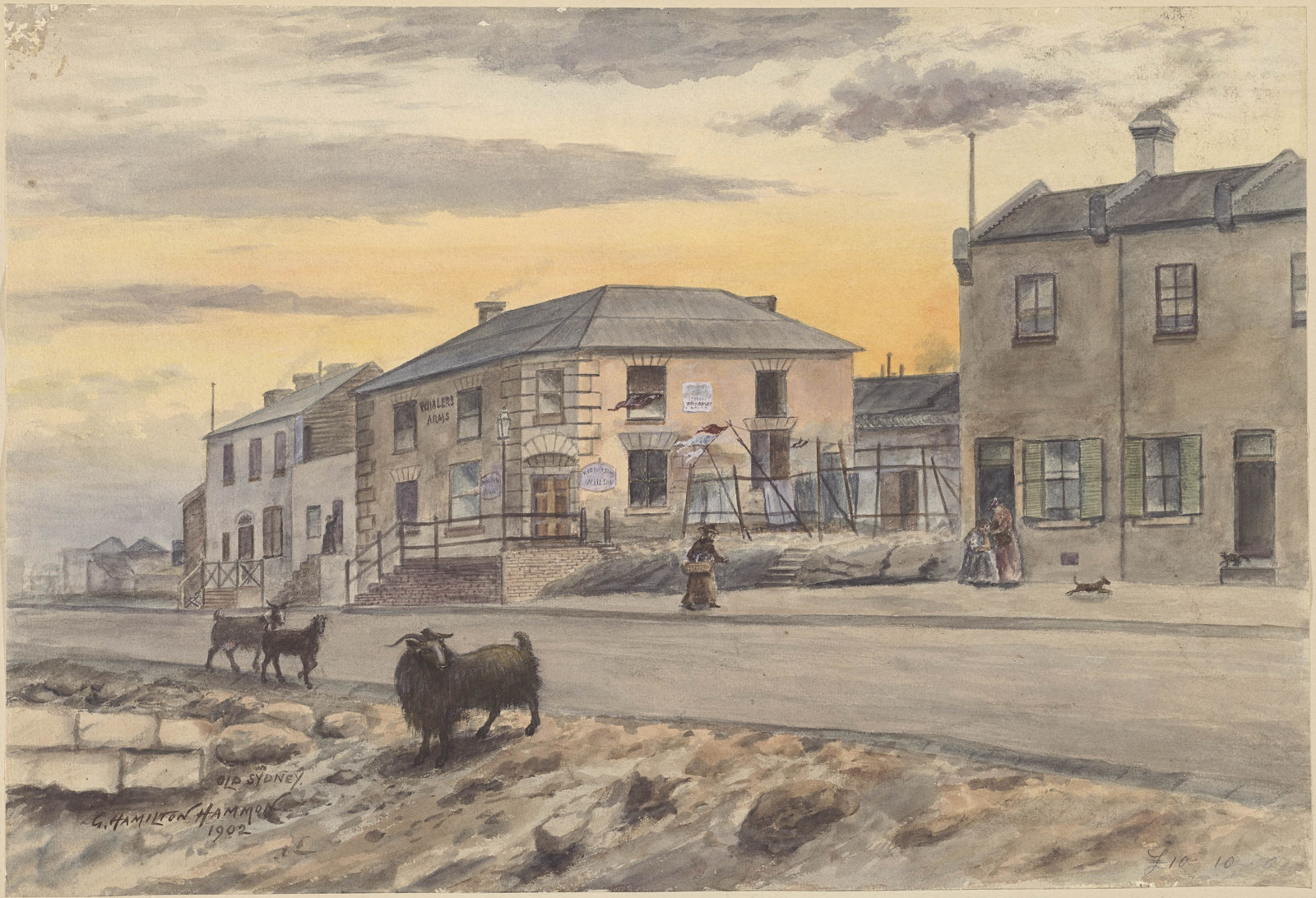 Painting of a street scene showing two storey buildings on the high side of a dirt road. One the low side in the foreground a goat grazes amongst the rocks..