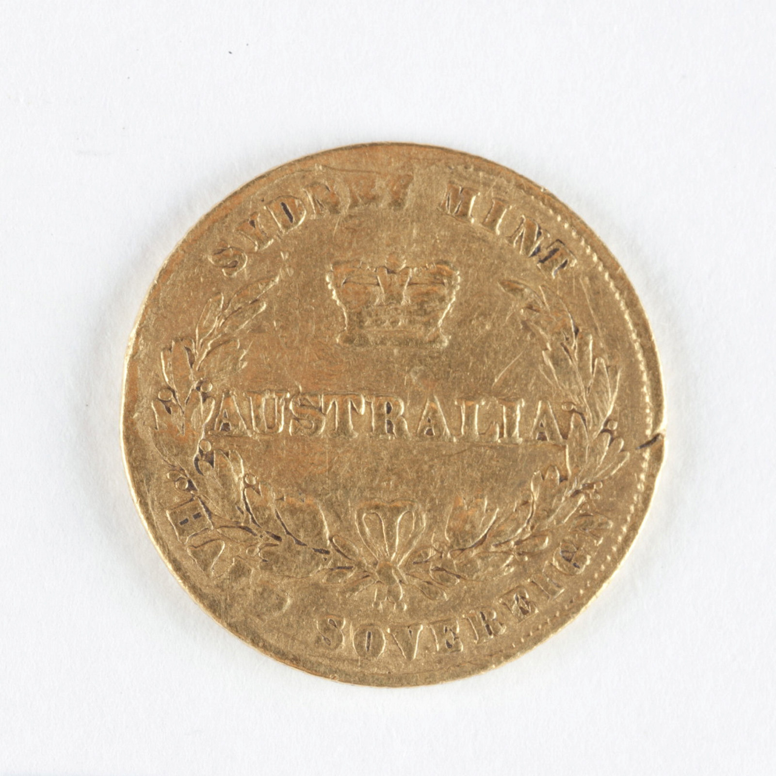 Reverse of gold coin.