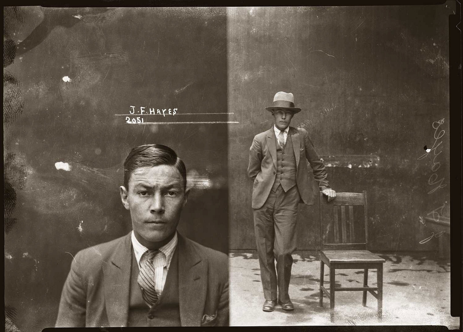 Black and white mugshot of man against wall, left hand side image closeup without hat, right hand side image full standing shot with hat on, leaning on chair.