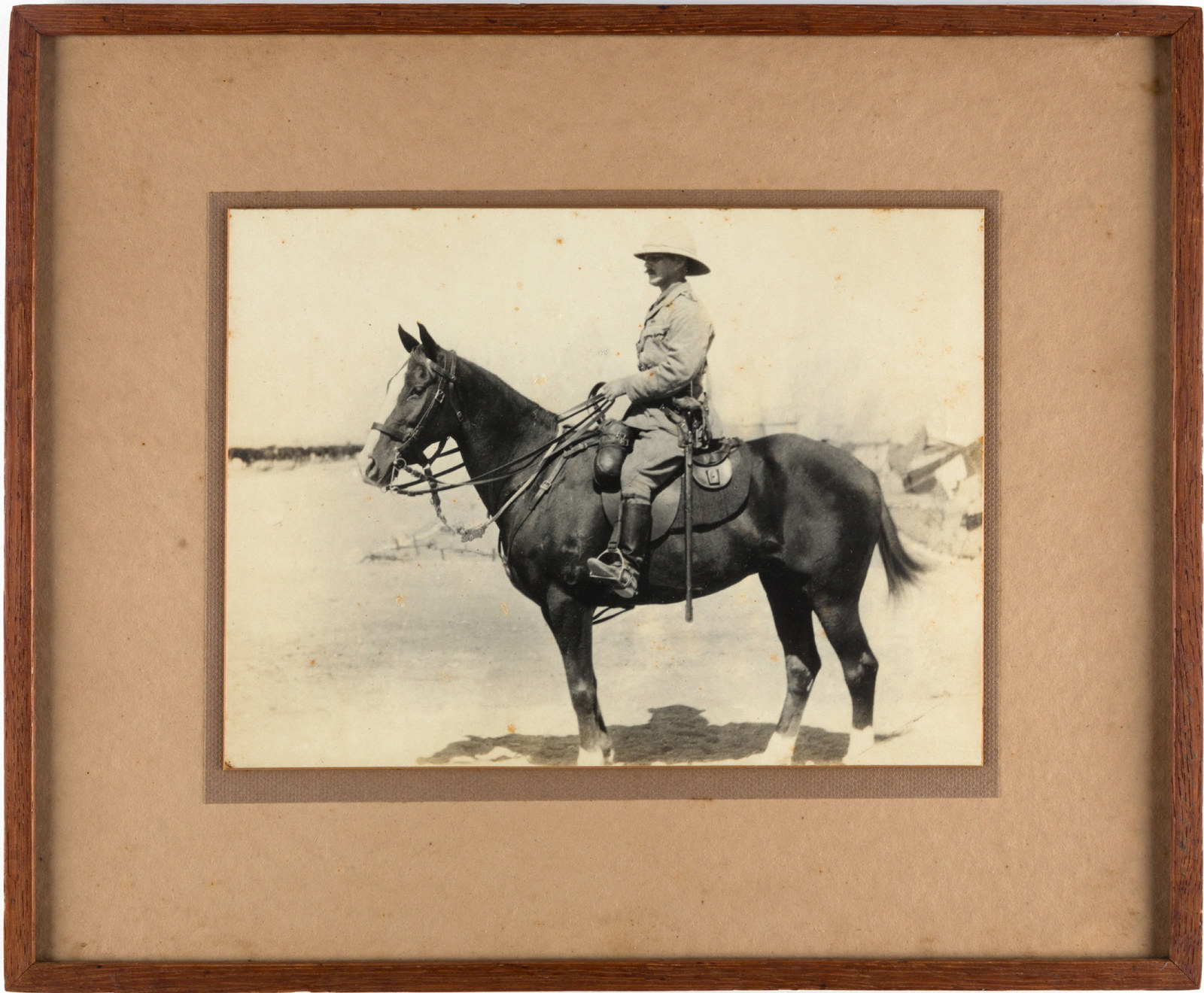 Framed photograph of 2nd Lieutenant Norman Matthew Pearce mounted on his horse, Maadi, Egypt, 1915