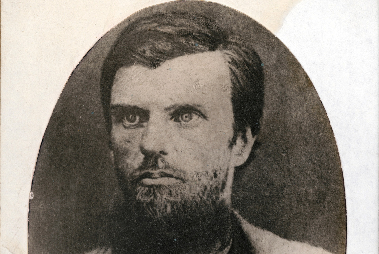 Cropped version of photo portrait of bearded man, mounted on card.