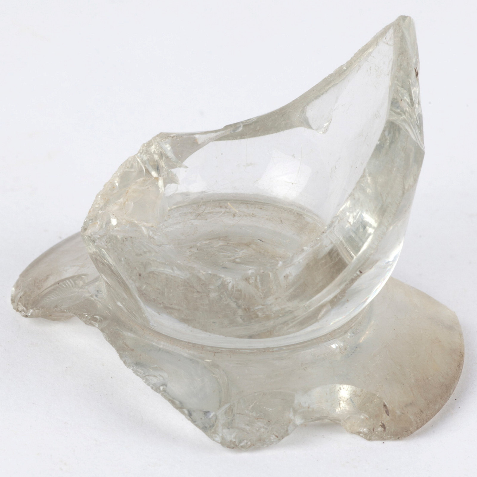 Sharp glass bottle bottom fragment.