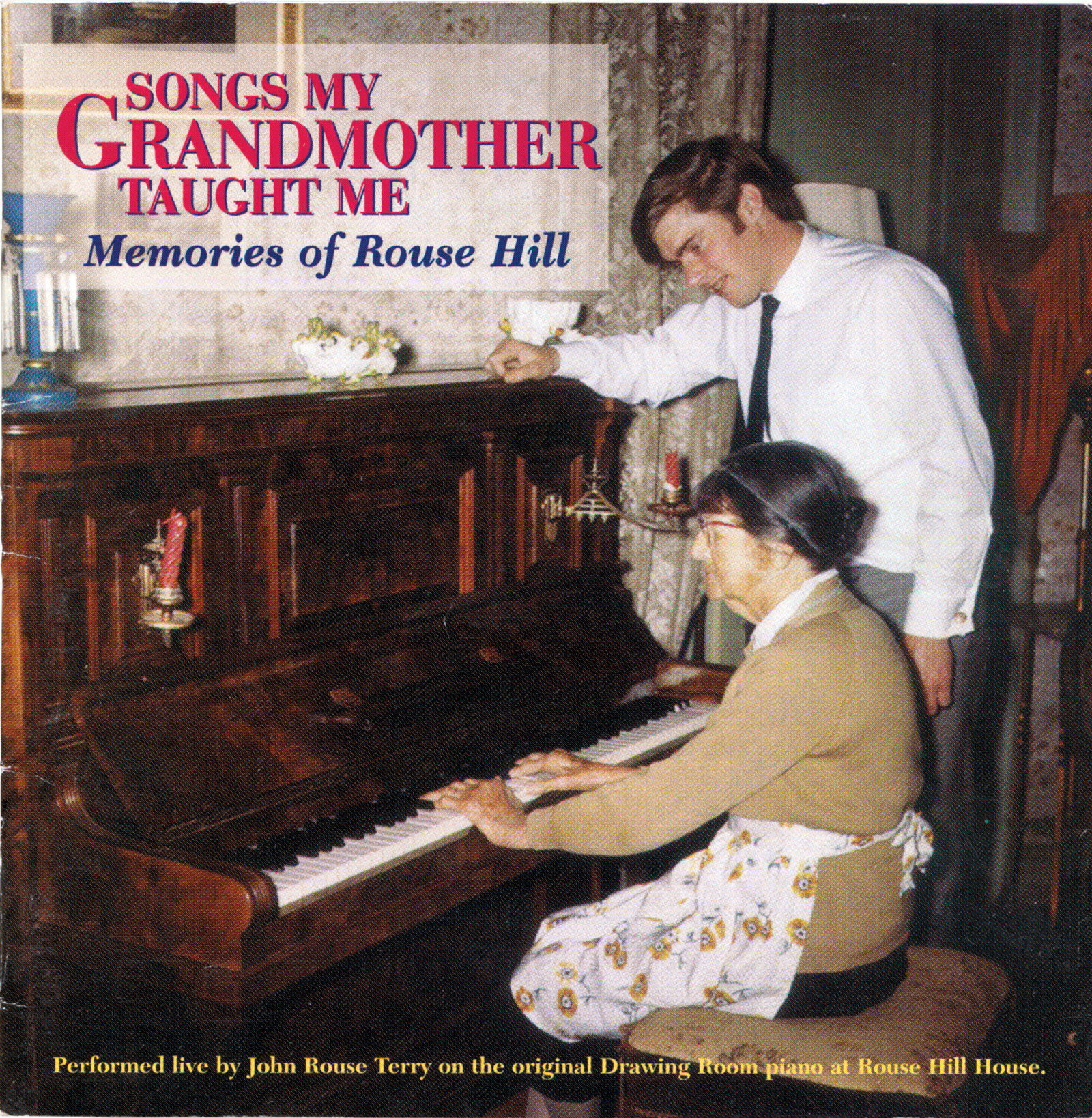 Cover of album with woman seated at piano playing while young man looks on.