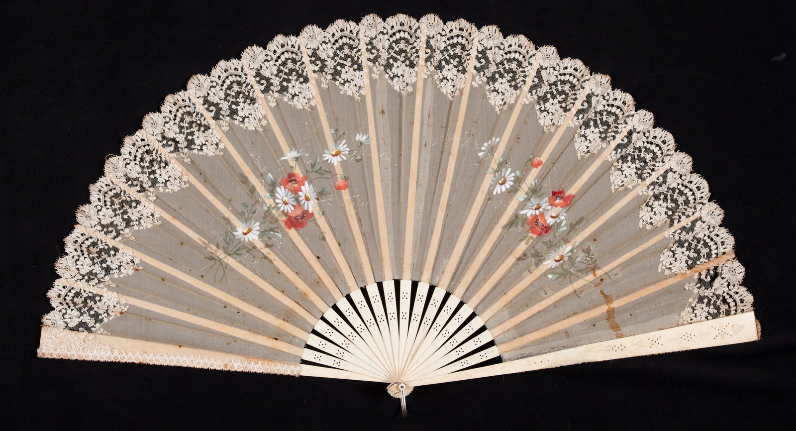 Pleated concertina fan. Lace and netting with painted decoration and ivory sticks. Late 19th century.