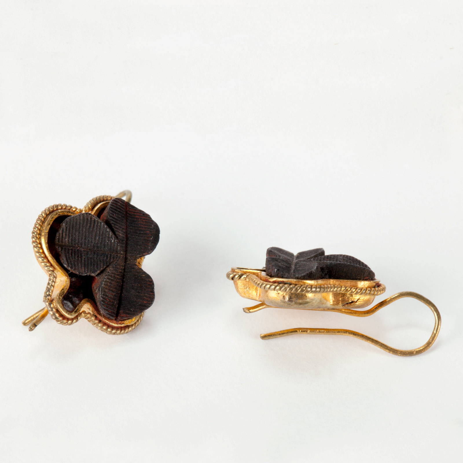 Pair of gold and bog oak earrings designed for pierced ears, 1860s