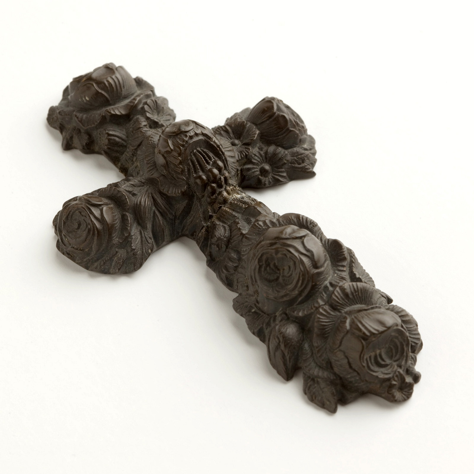Handcarved cross with floral relief decoration, circa 1860s