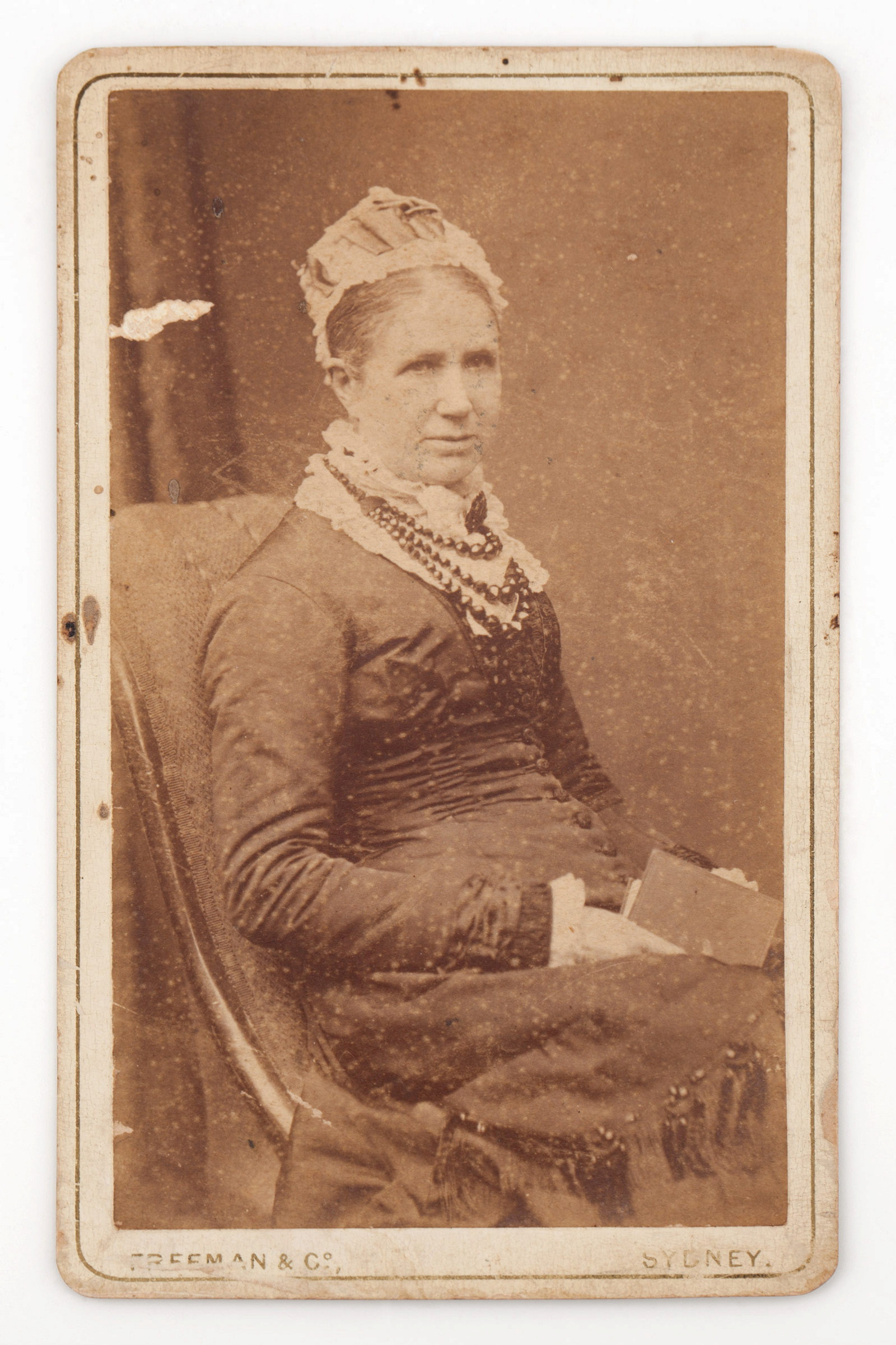 Carte de visite photograph of Elizabeth Buchanan wearing jet mourning beads and a mourning brooch, 