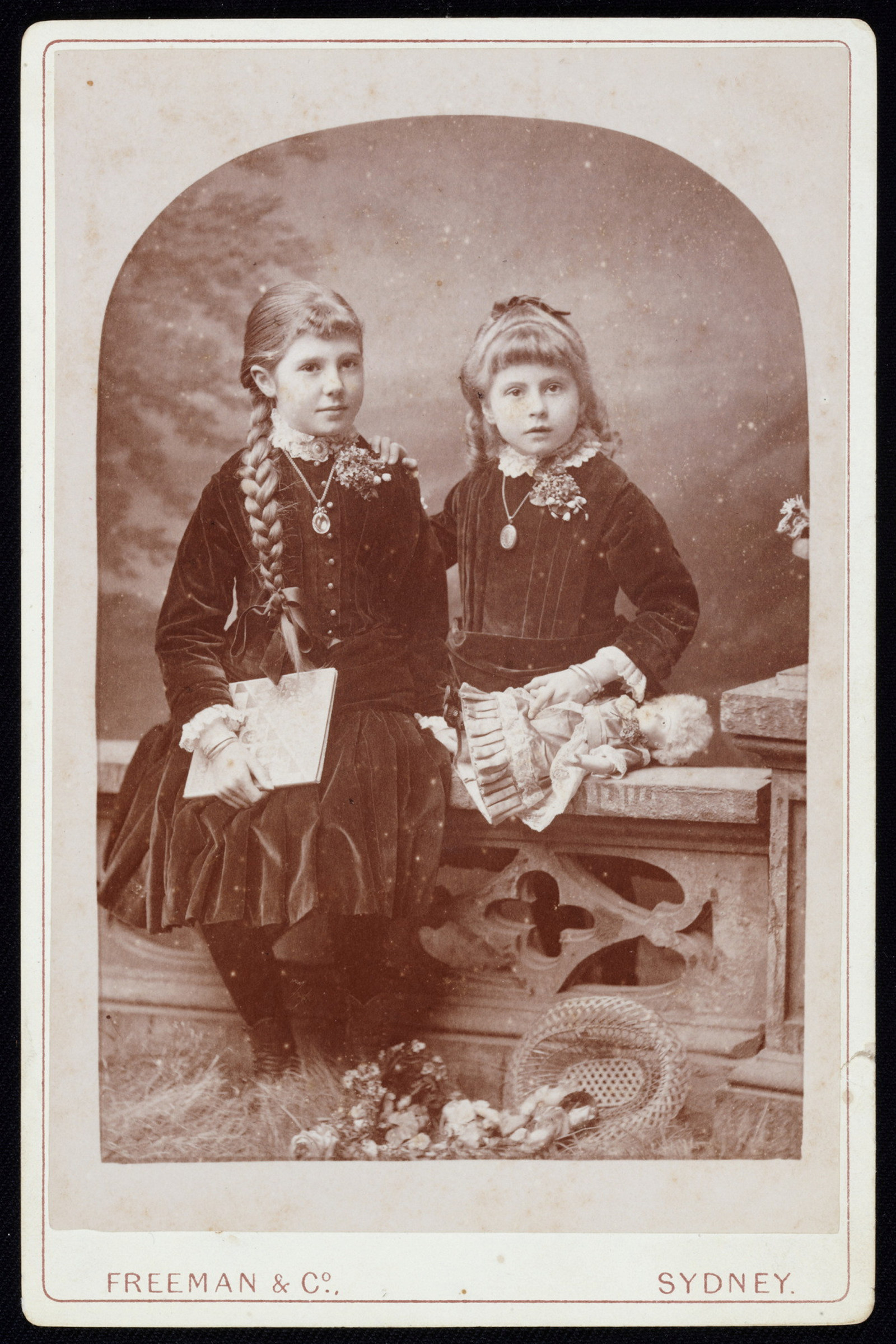 Photograph from album. Nina &amp; Kathleen Rouse as children.