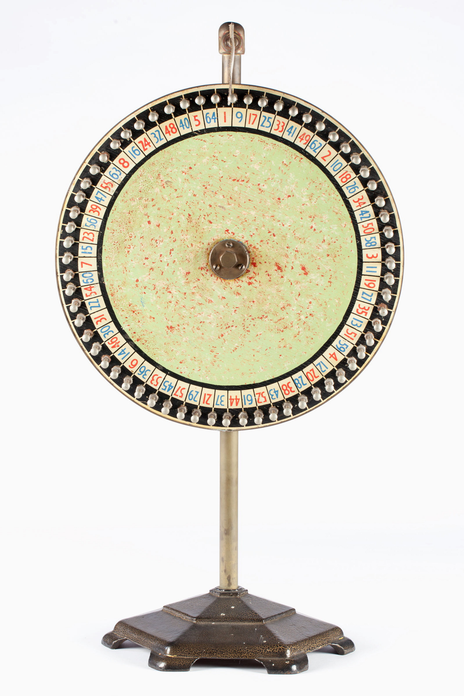 Circular wheel, or Chocolate wheel, on a cast metal stand, mid 20th century