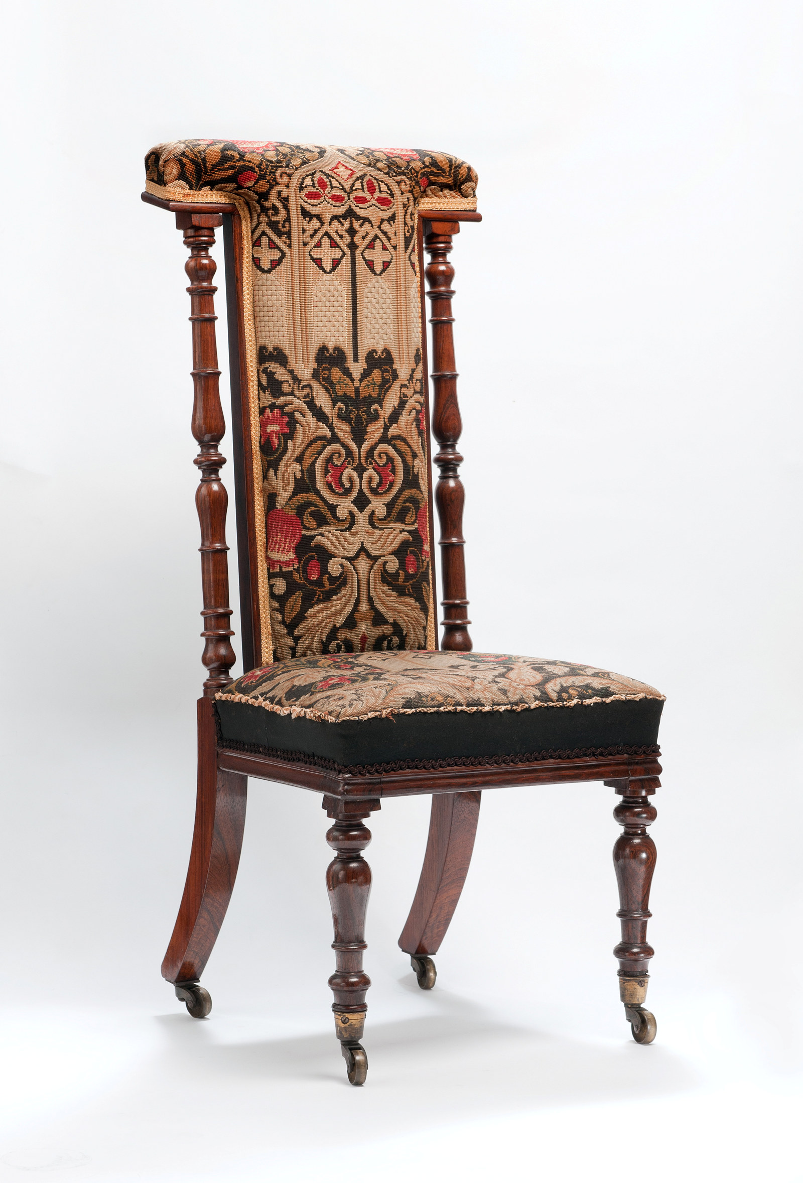 Rosewood prie dieu chair with back and seat upholstered in Berlin Woolwork, circa 1850
