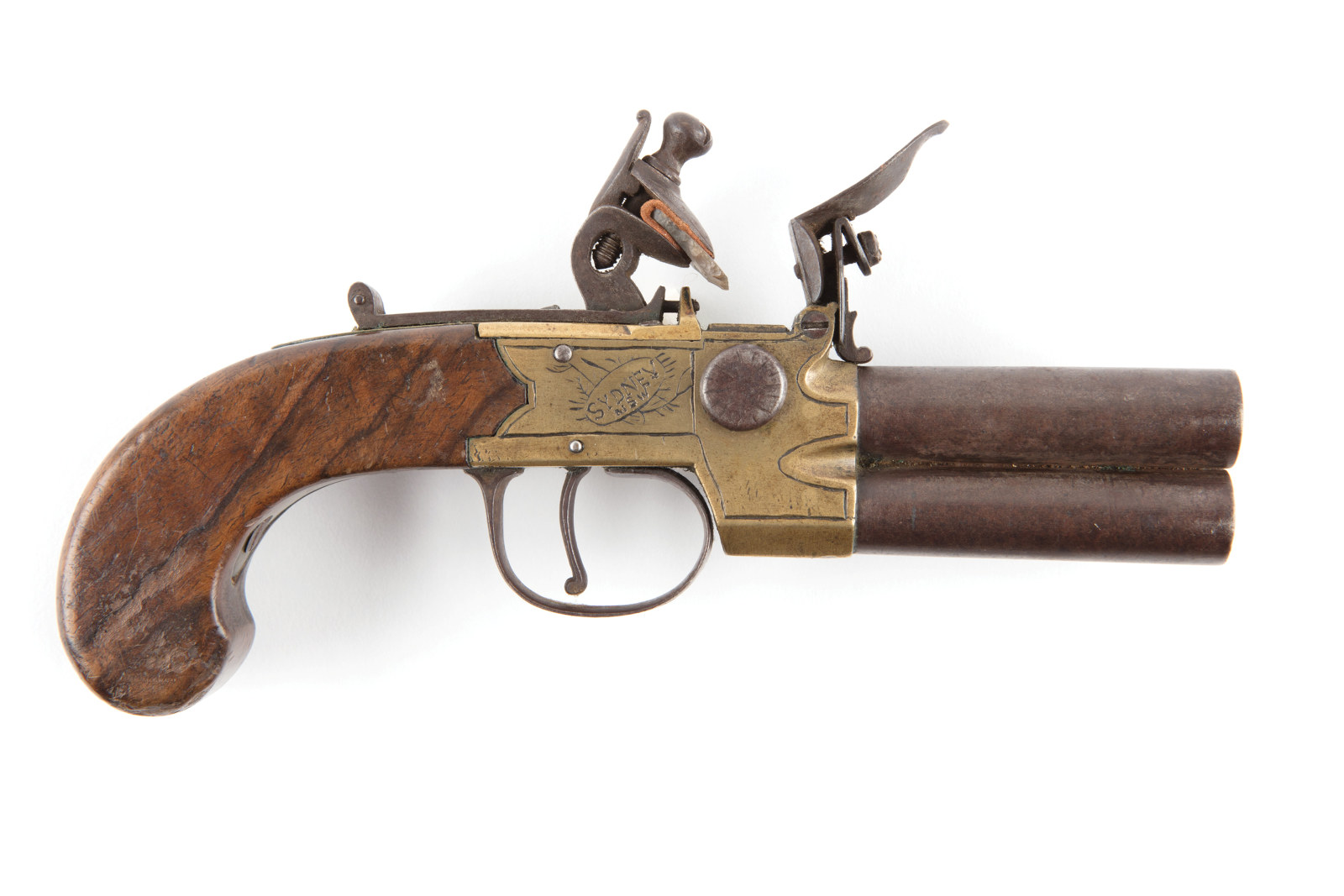 Wood and brass pistol.