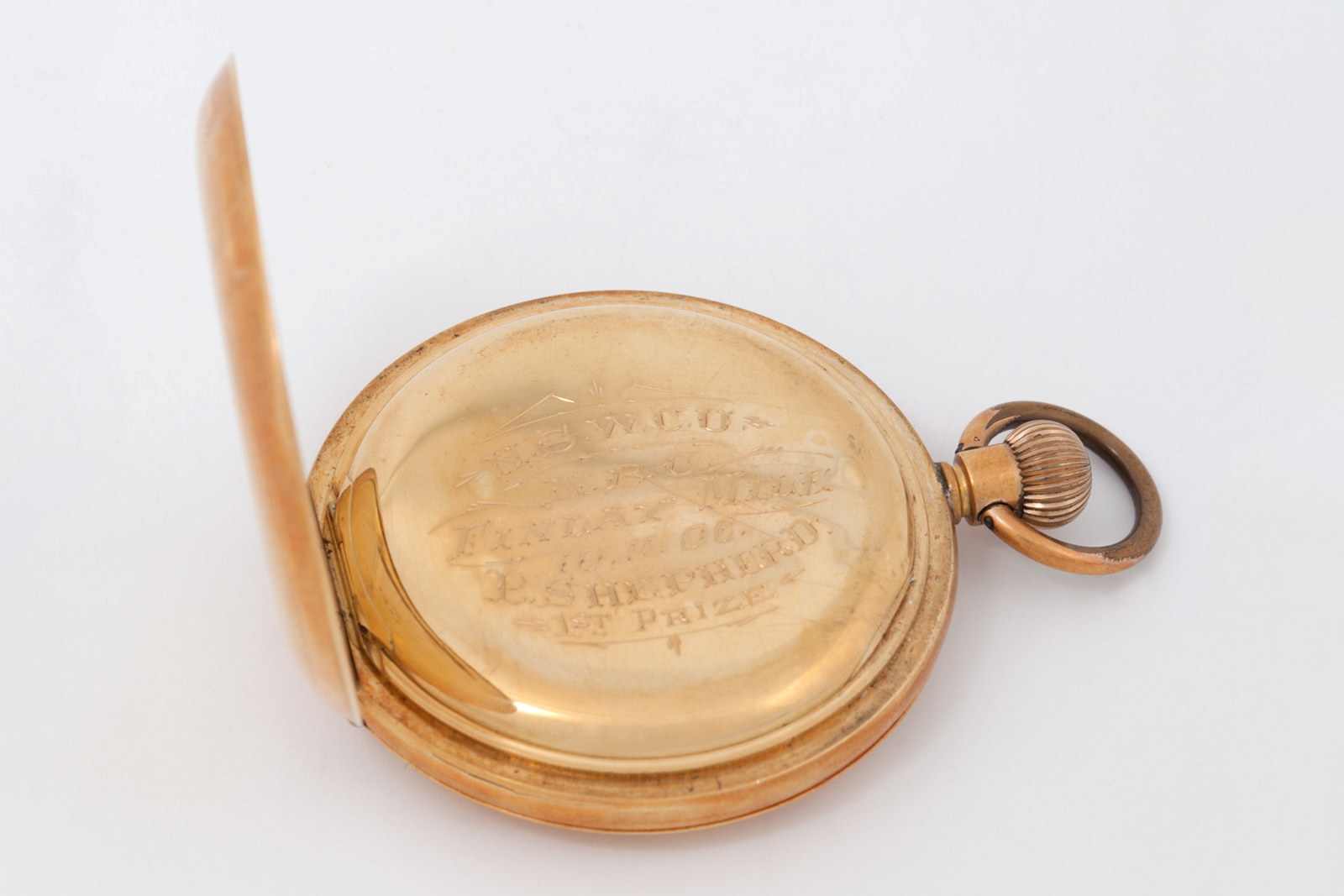 Gold pocket watch which belonged to a police officer, Sgt Percival Shepherd