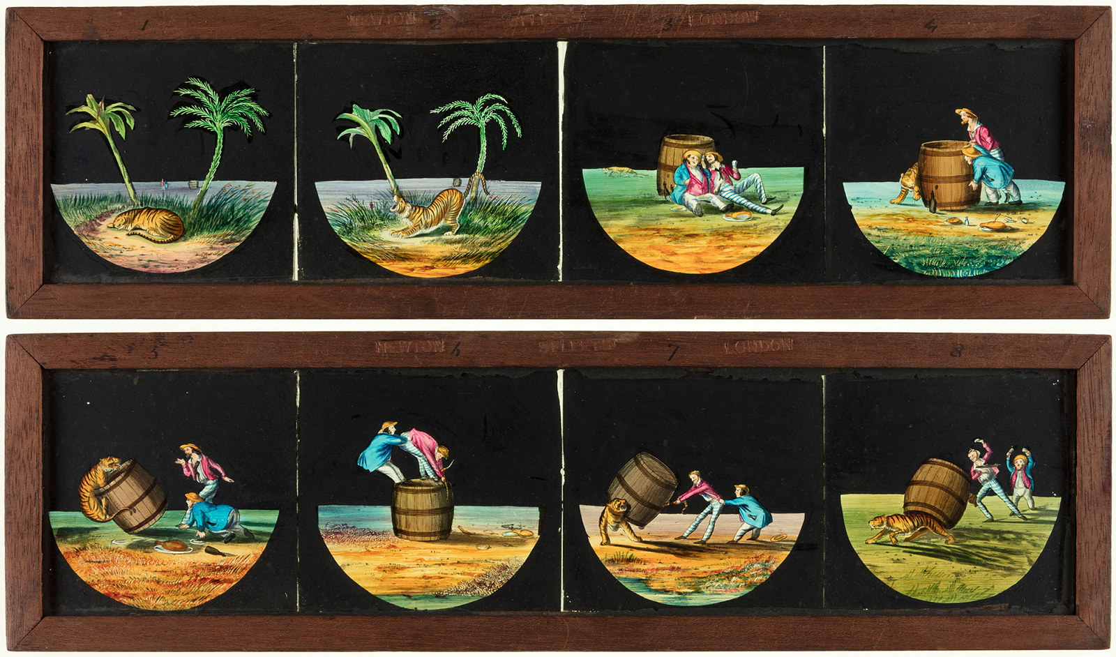 Two static, timber-framed glass slides for a magic lantern. These slides feature a sequence of individual hand-painted scenes of two men on a desert island with a tiger.