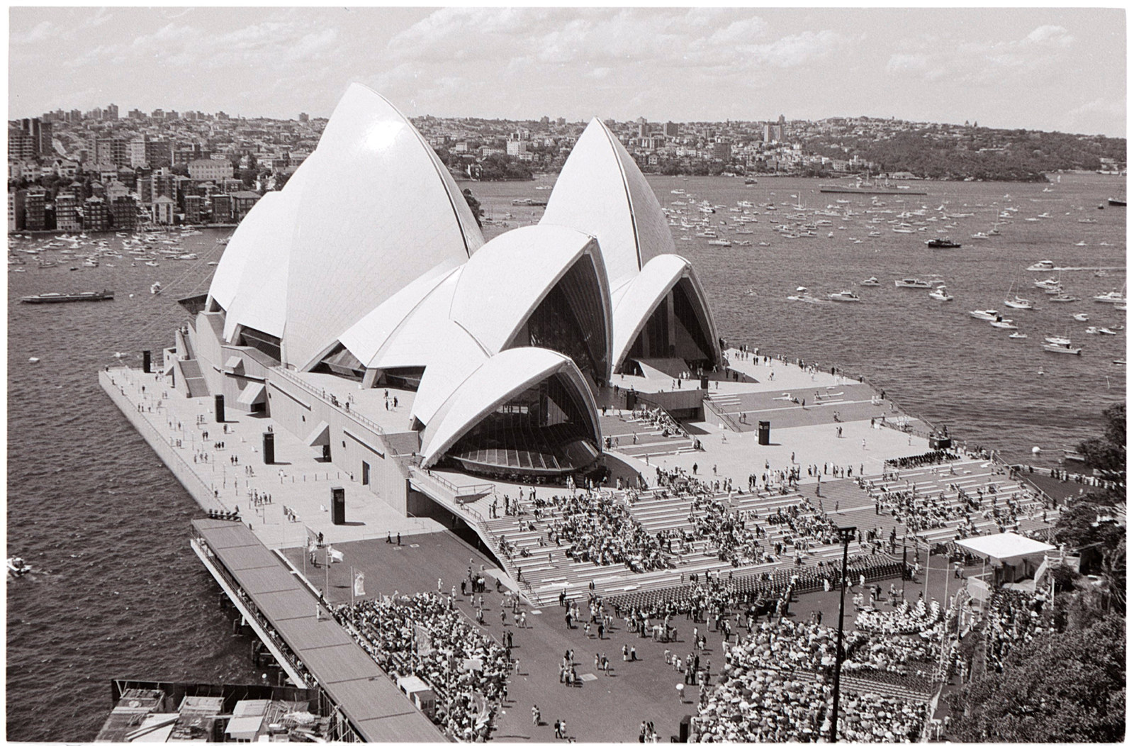 Crowds begin to take their place before the arrival of HM the Queen to open the Sydney Opera House, October 20, 1973