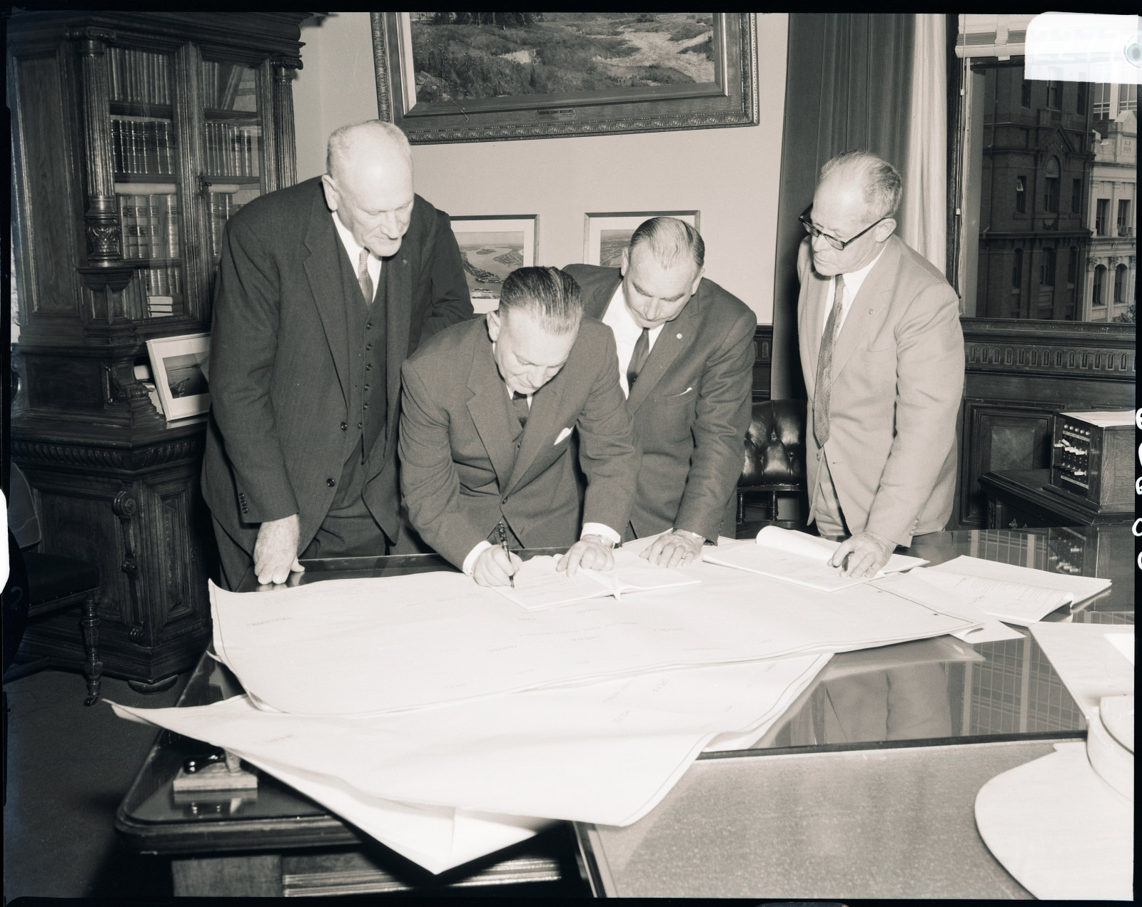 Government Printing Office 2 - 22777 - Signing of Stage II contract, Sydney Opera House [By the Hon. Mr Ryan, Minister, Public Works; interiors; documents] [GPO original locations or series - St60680] [18/10/1962]