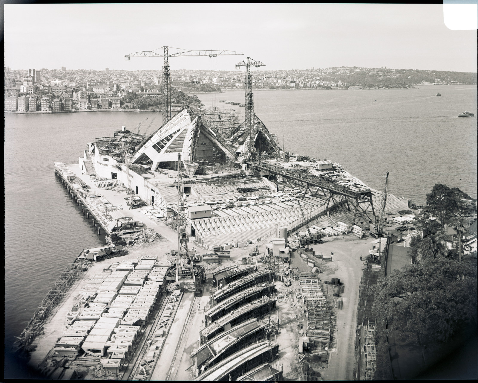 Government Printing Office 2 - 26338 - Opera House and surrounds from Unilever Building. South of site [Department of Public Works. Progress shots of Sydney Opera House; building construction] [GPO original locations or series - St67783] [20/11/1964]