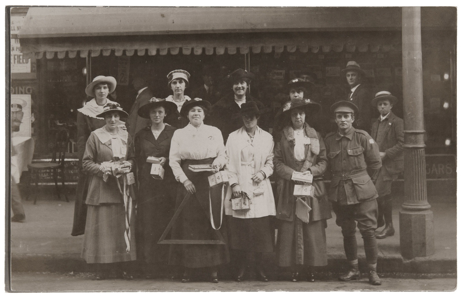 Women collectors on a city street in Sydney during World War 1, fundraising for the Y.M.C.A. Red Triangle Day appeal, 1 June 1917