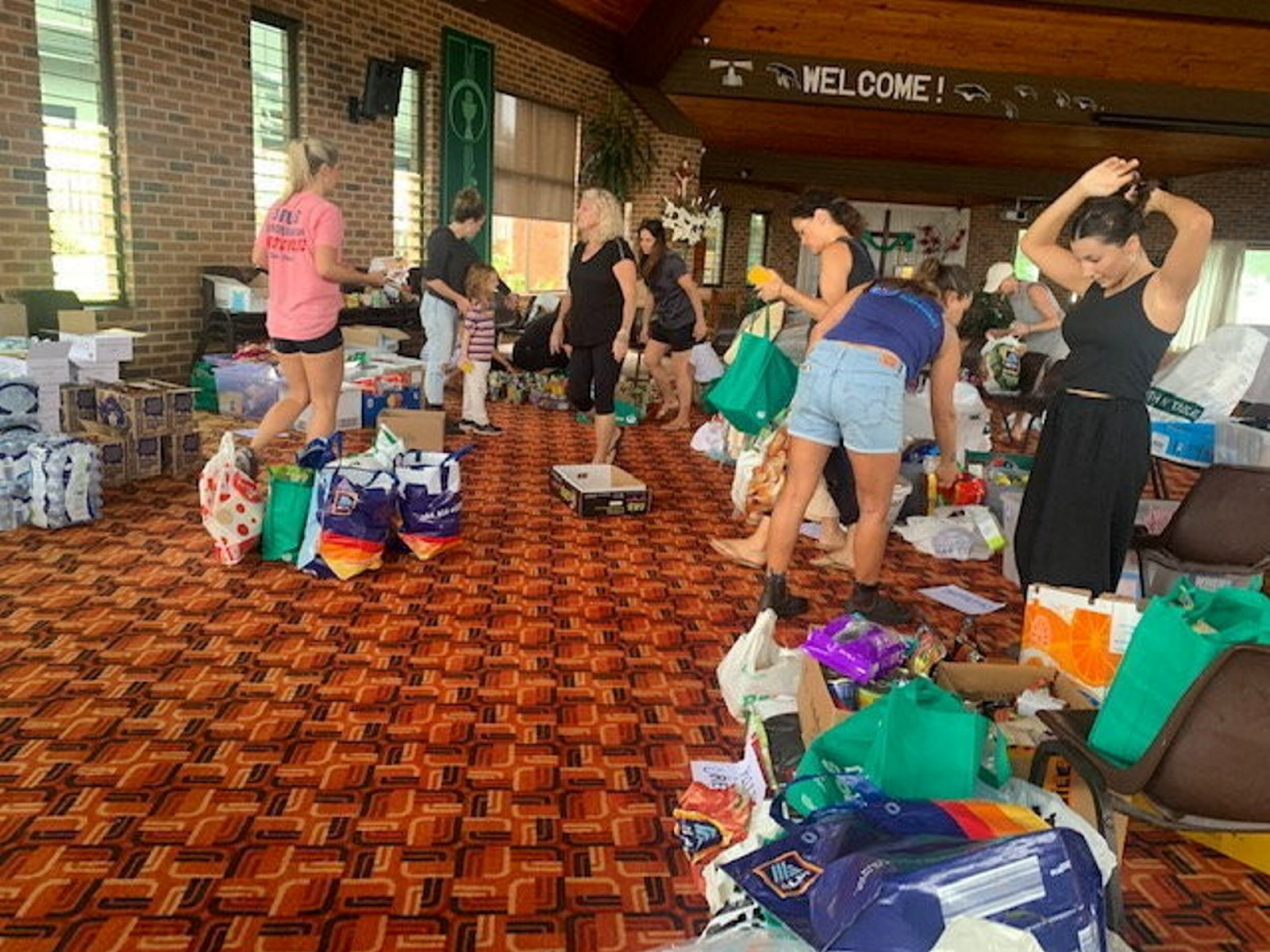 People in a community centre during the NSW floods in 2022