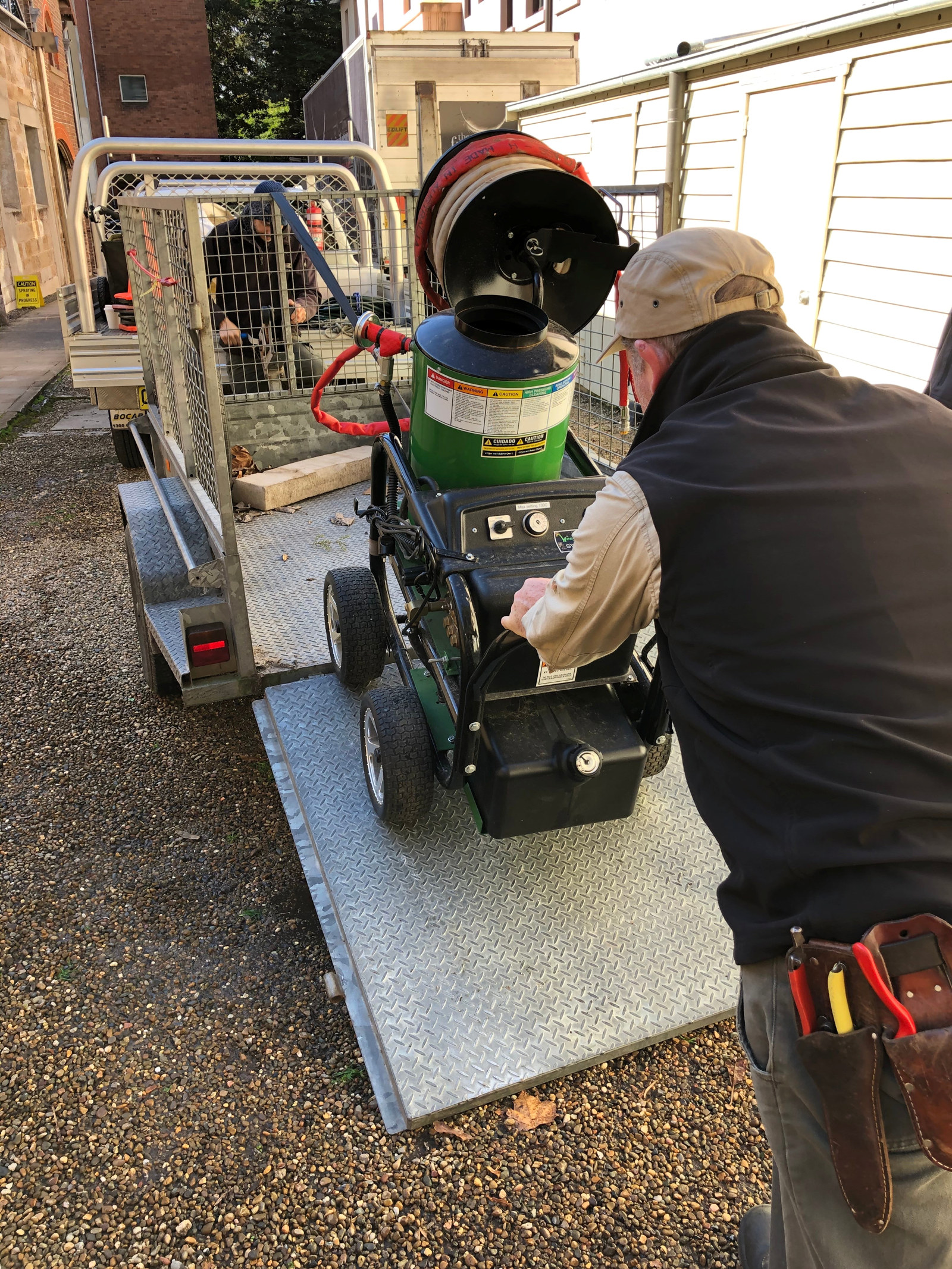 SLM Horticulturists load the steam weeder onto the trailer ready for transport to another site!