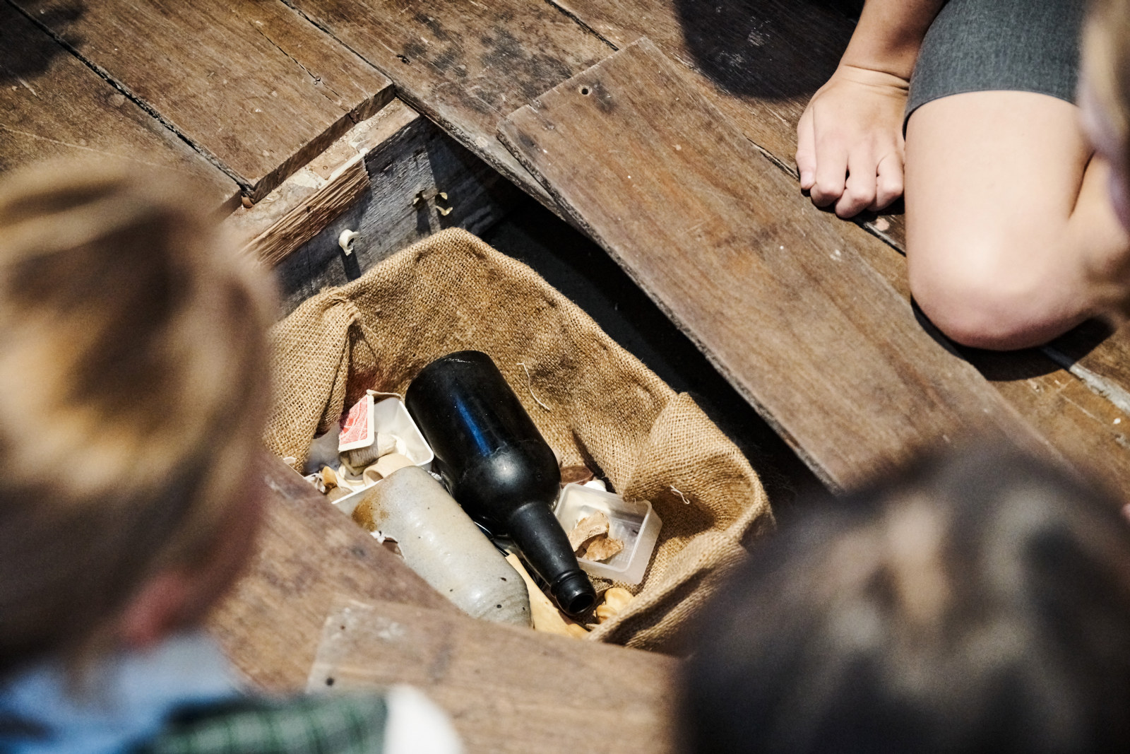 Students examining archaeology on the Home: Convicts, Migrants & First People Learning program at Hyde Park Barracks