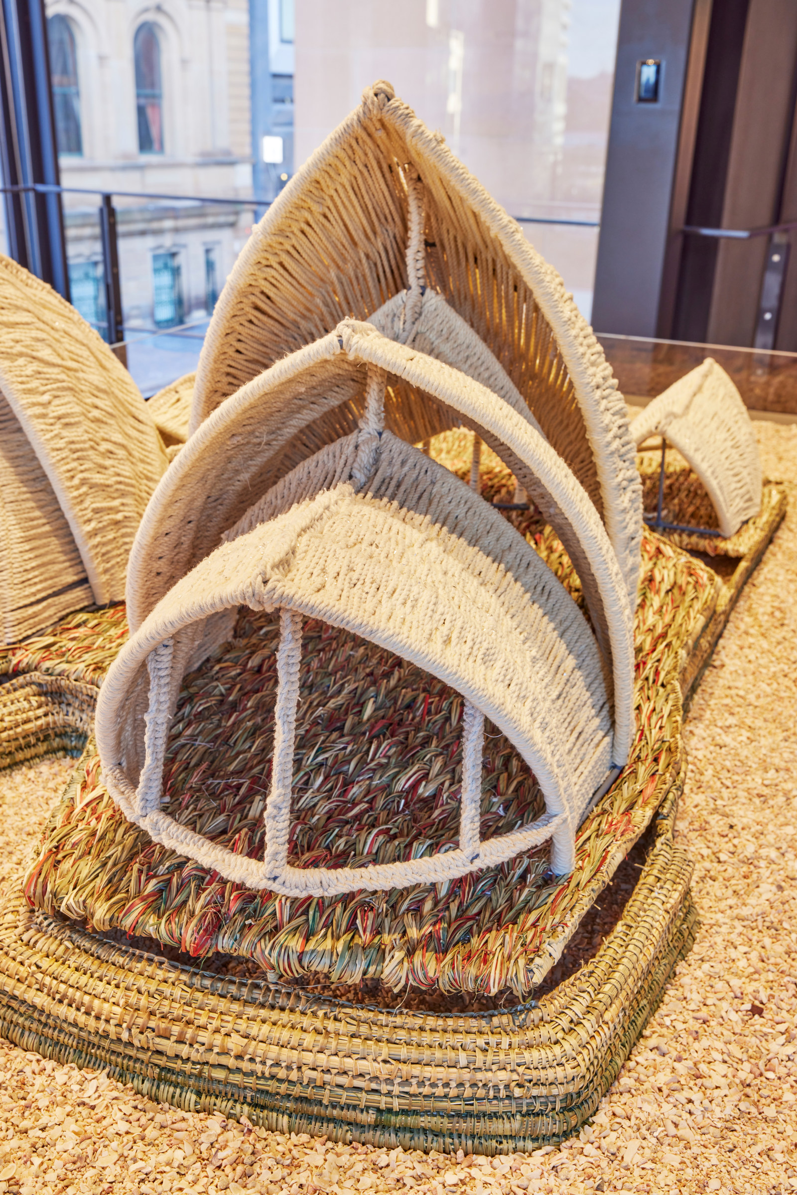 Close up view of Steven Russel and Phyllis Stewart 'Untitled (woven Sydney Opera House)', 2023 - The People's House marketing & installation photoshoot - The People's House marketing & installation photoshoot